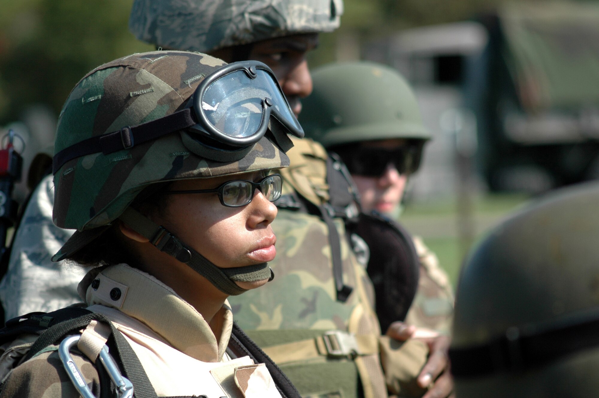 Students from the Advanced Contingency Skills Training Course 09-1 listen to instructions for basic field tactics during training on a Fort Dix, N.J. range Oct 4, 2008.  ACST is taught by the U.S. Air Force Expeditionary Center's 421st Combat Training Squadron at Fort Dix and in fiscal 2008 prepared more than 1,500 Airmen for deployments. (U.S. Air Force Photo/Staff Sgt. Paul R. Evans)