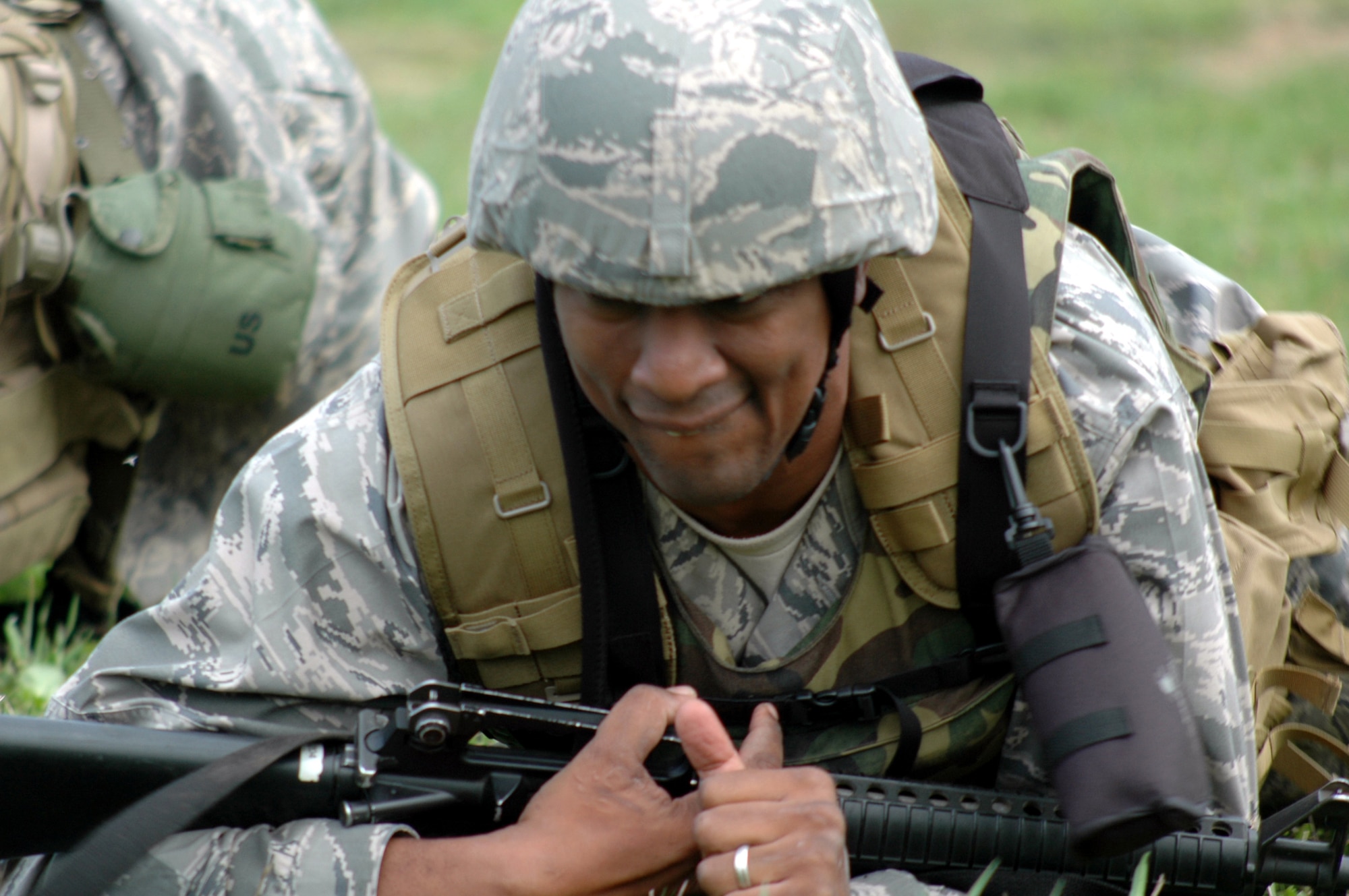 Capt. Joseph Starr, from Robins Air Force Base, Ga., crawls during the field tactics training portion of the Advance Contingency Skills Training course 09-1 on a Fort Dix, N.J., range Oct 4, 2008.  ACST is taught by the U.S. Air Force Expeditionary Center's 421st Combat Training Squadron at Fort Dix and in fiscal 2008 prepared more than 1,500 Airmen for deployments. (U.S. Air Force Photo/Staff Sgt. Paul R. Evans)