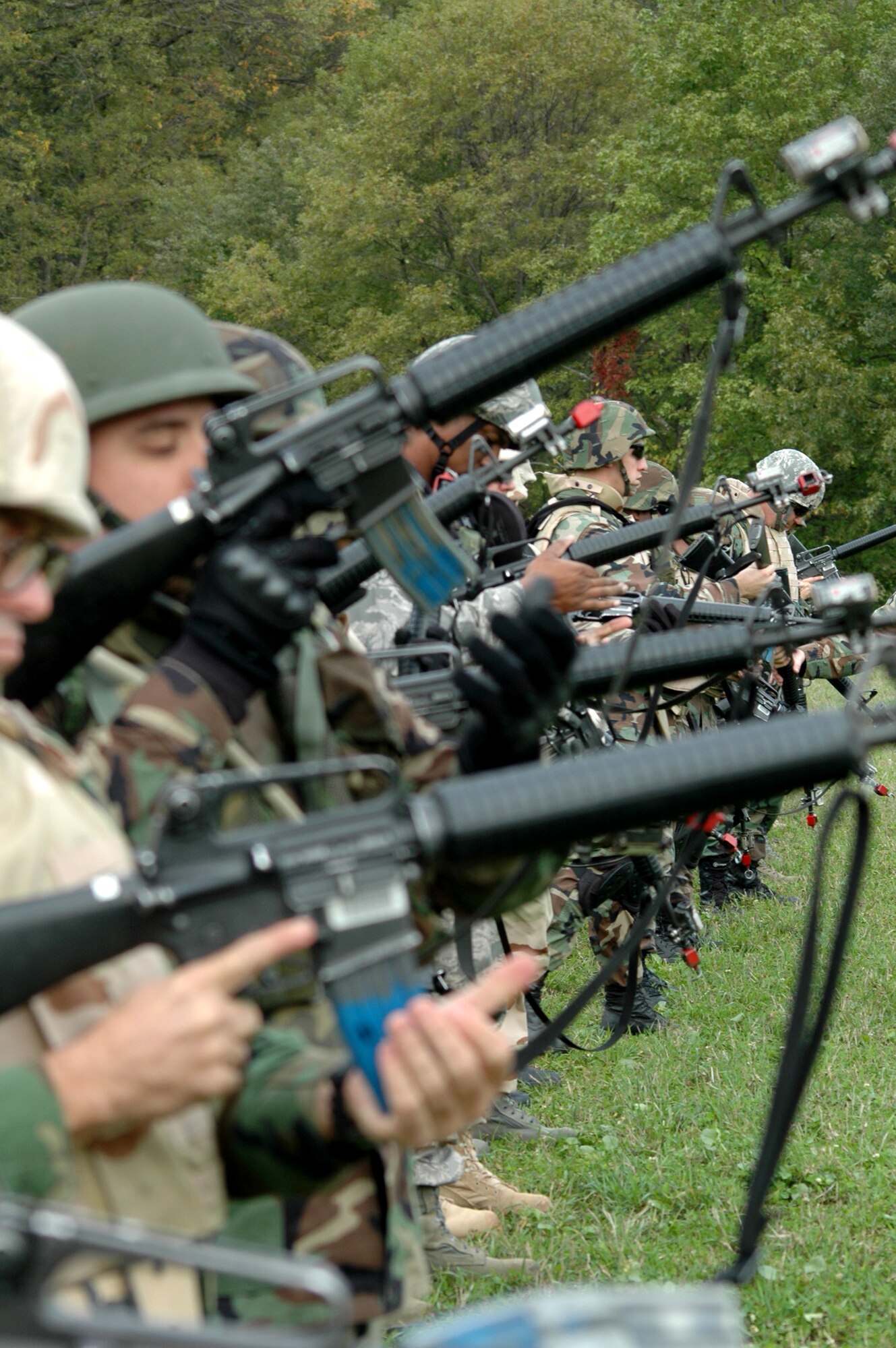 Students from the Advanced Contingency Skills Training (ACST) Course 09-1 practice weapons handling drills on a Fort Dix, N.J., range in preparation for tactical battle drills Oct 4, 2008.  ACST is taught by the U.S. Air Force Expeditionary Center's 421st Combat Training Squadron at Fort Dix and in fiscal 2008 prepared more than 1,500 Airmen for deployments. (U.S. Air Force Photo/Staff Sgt. Paul R. Evans)