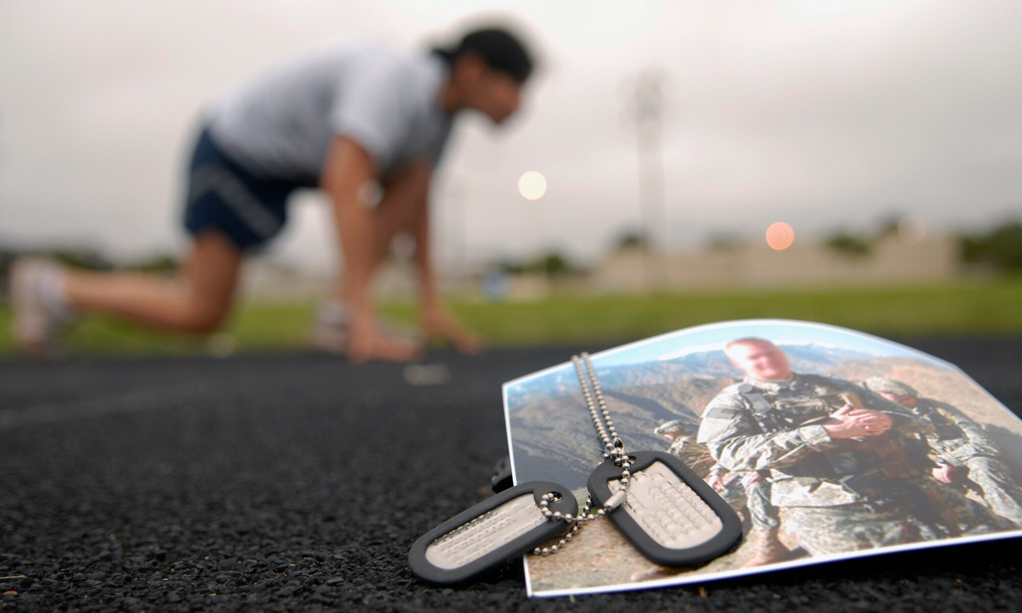 From Oct. 20 to Nov. 11, "A Run to Remember" allows active duty military, civilians, contractors and retirees to run one mile for each servicemember who fell in the line of duty in support of Operations Iraqi and Enduring Freedom. For each mile, the runner is asked to donate $5 to charities within the Combined Federal Campaign that benefit wounded and fallen warriors.  (U.S. Air Force photo graphic/Airman 1st Class Christopher Hubenthal)