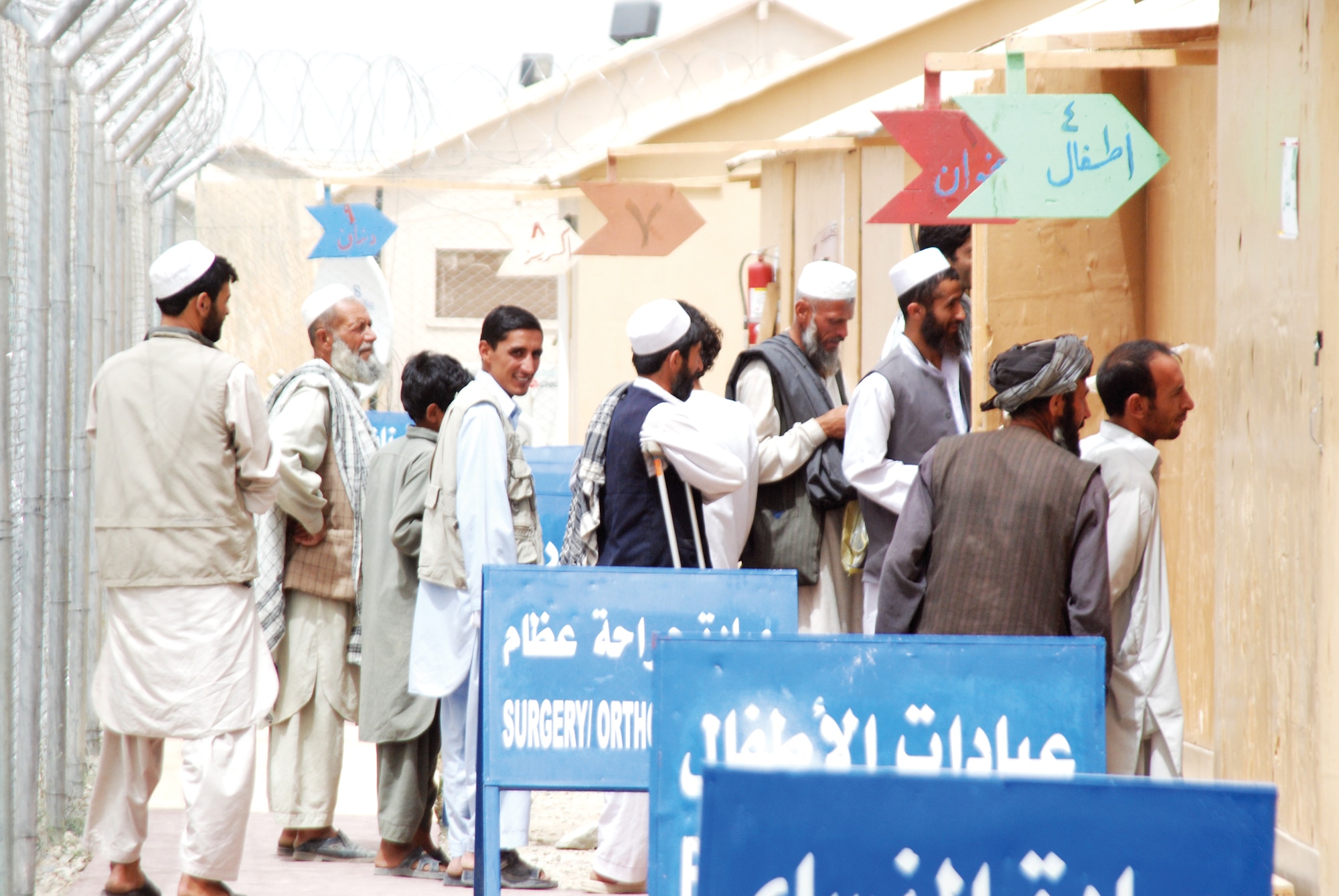 BAGRAM AIR FIELD, Afghanistan -- Afghans wait in line outside of the Egyptian Field Hospital at Bagram Air Field. The clinic cares for Afghans as well as Coalition service members supporting Operation Enduring Freedom. (U.S. Air Force photo by Senior Airman George Cloutier/Released)