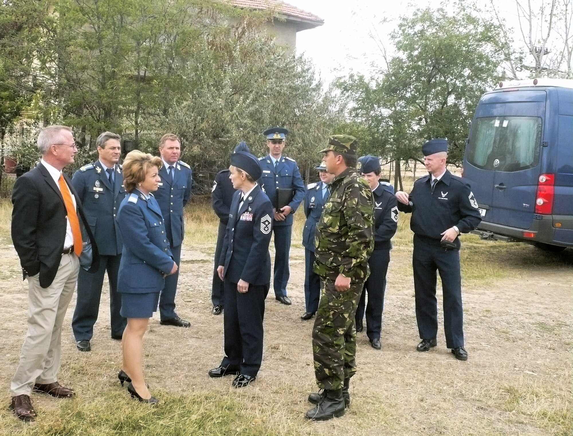 Chief Master Sgt. Pamela Derrow, United States Air Forces in Europe command chief, (center) and three other senior noncommissioned officers from Ramstein Air Base, Germany, visit with Romanian air force senior enlisted leaders at the Boboc Training Center, Romania, Sept. 22-27 as part of an ongoing USAFE theater security cooperation engagement. The senior NCOs familiarized themselves with Romanian enlisted development, education and technical training, and senior NCO and NCO academy organizational structure, roles and mission. (U.S. Air Force photo)
