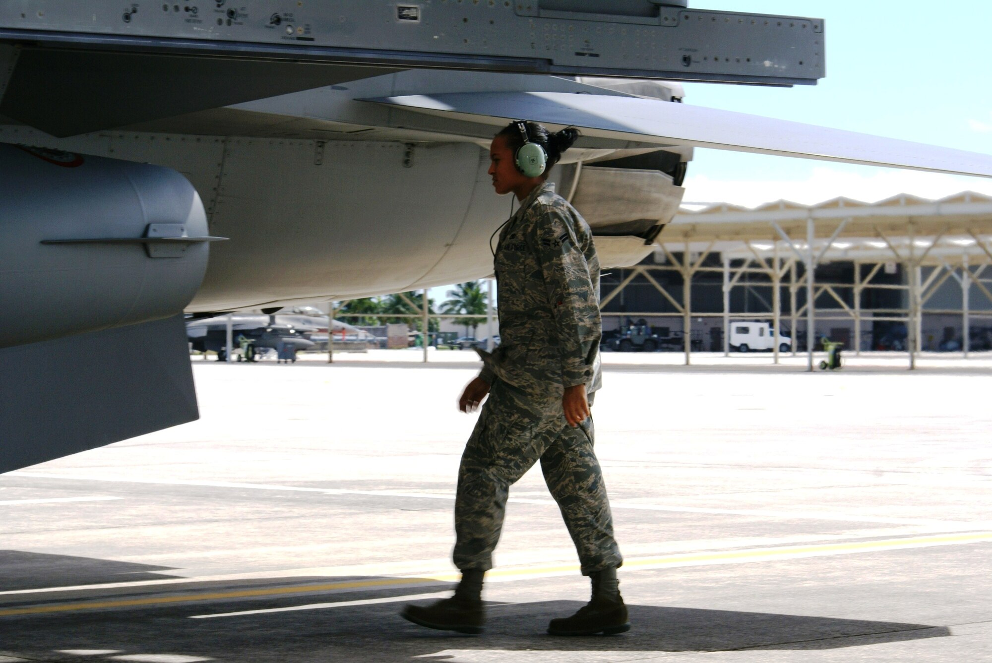 Airman 1st Class Christy Leyva, F-16 crew chief apprentice, 482nd Aircraft Maintenance Squadron takes part in a pre-flight inspection of an F-16 on Oct. 6.  This was Airman Leyva’s first day on the job after graduating from a 19-week technical training school in Texas.  For information about becoming a crew chief or other interesting Air Force jobs, call the Homestead Air Reserve Base recruiters at (305) 224-7127. (U.S. Air Force photo/Tim Norton) 