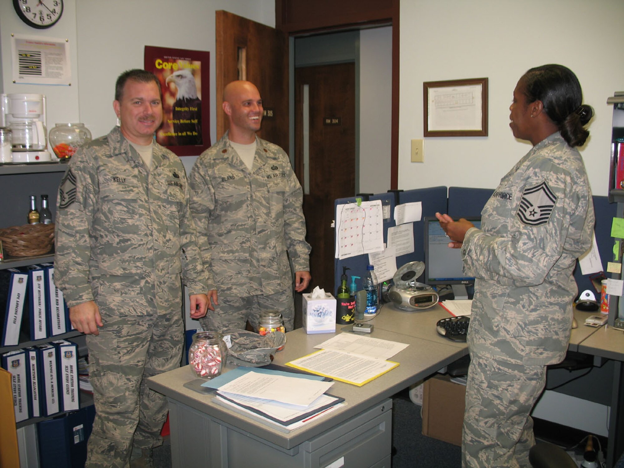 SEYMOUR JOHNSON AIR FORCE BASE, N.C. -- On Sept. 14th the 916th Services Flight was visited by Maj. Joseph Bland, chief combat support branch for Air Force Reserve Command and Chief Master Sgt. Daniel Kelly, chief enlisted manager.. The two members from AFRC Headquarters were recently visiting Pope Air Force Base and came to Seymour Johnson to meet the 916th Services members. During their visit they answered questions and addressed  concerns of the services flight members.  Chief Master Sgt. Kelly (left), Maj. Bland (center) and Senior Master Sgt. Tucker discuss issues regarding Air Force Reserve Command's  future merger of mission support and services  into one force support squadron, (FSS). Active duty has already implemented this merge and now the Reserve is beginning the process.