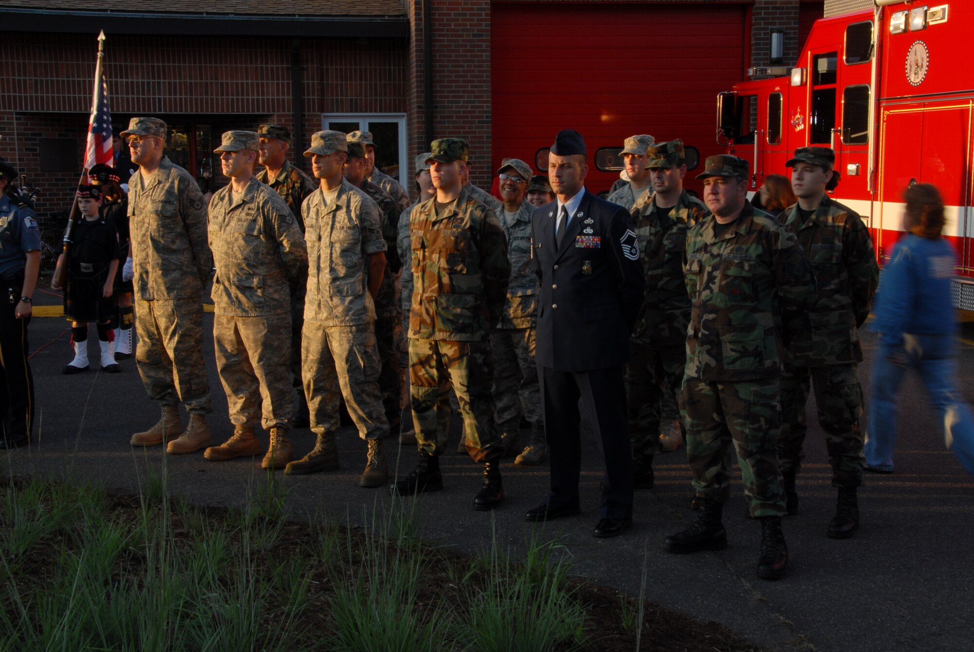 Members of the 103rd Airlift Wing stand in formation during the 9-11 Memorial Service at the Enfield Fire Department, Enfield, Conn. on September 11, 2008.  (U.S. Air Force Photo by Senior Airman Kerry P. Carbonell)
