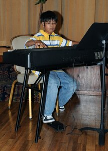 Robbie Elefante won the Preteen 9-12 Solo Act division with a song called ?Boher Bumble Boogie? and was later named ?Best in Show." (U.S. Air Force photo by Rich McFadden)