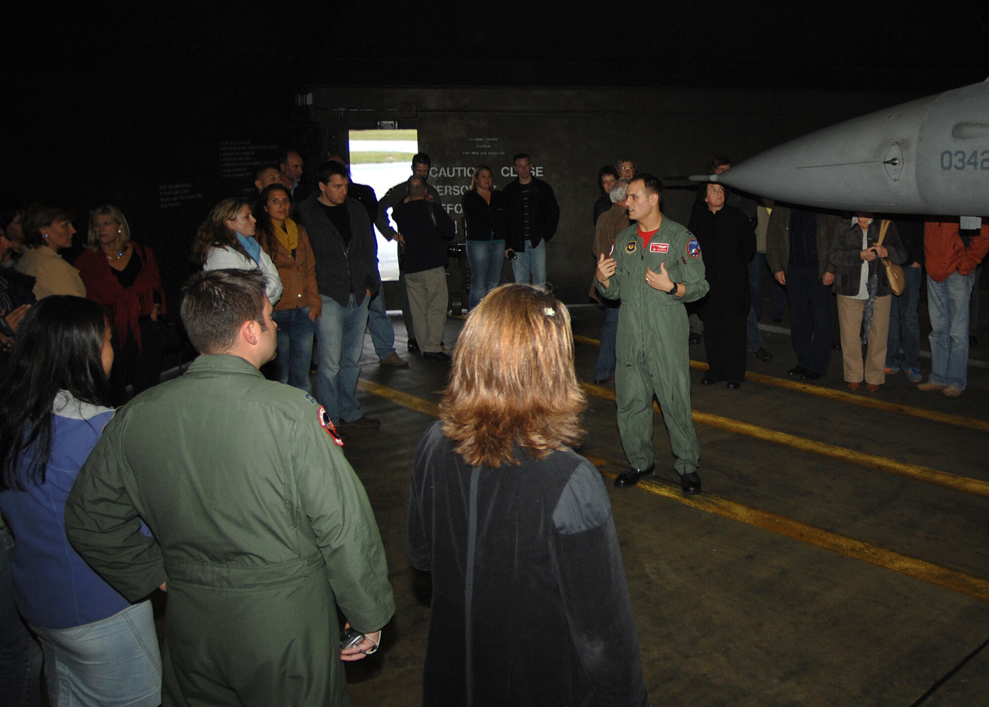 SPANGDAHLEM AIR BASE, Germany -- Capt. Anthony Medaglia, 22nd Fighter
Squadron, explains the role of the F-16 Fighting Falcon during a
German-American First Friday event Oct. 3, 2008. (U.S. Air Force photo by
Airman 1st Class Nathanael Callon)
