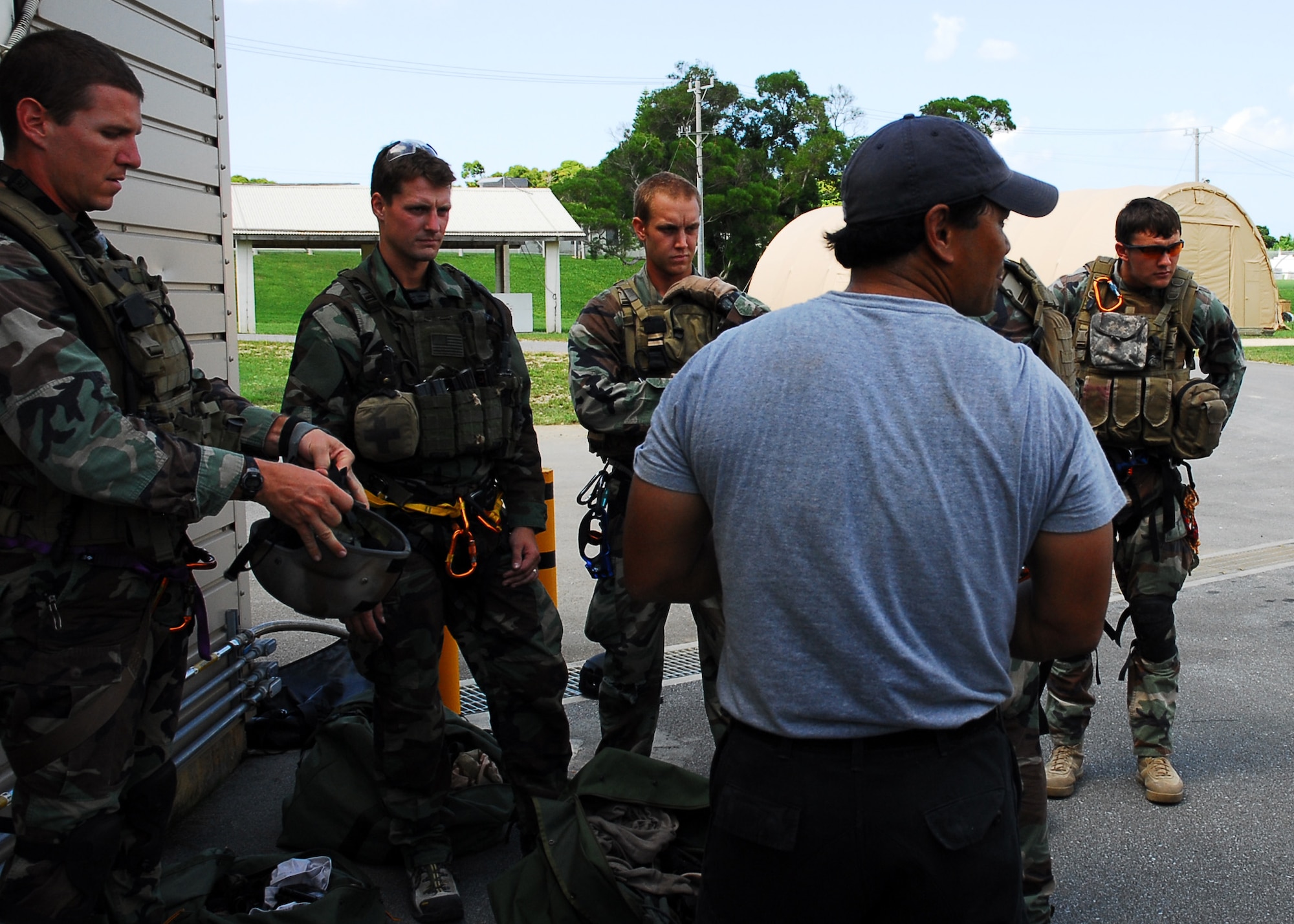 Members of the 31st Rescue Squadron are briefed on a confined space exercise at Kadena Air Base Oct. 3, 2008. The training was held at the Red Horse Training Ground.  (U.S. Air Force photo/Airman 1st Class Amanda Grabiec)