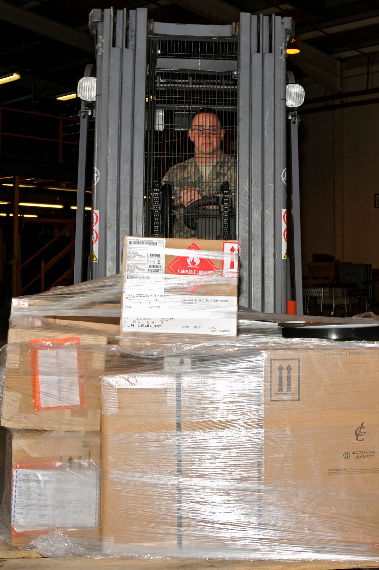 Airman 1st Class Michael Hoppe, 48th Logistics Readiness Squadron receiving apprentice, removes cargo from a truck Sept. 18 at RAF Lakenheath, England. In fiscal year 2008, approximately 18,000 tons of cargo was received though the inbound warehouse. (U.S. Air Force photo by Airman 1st Class Perry Aston)