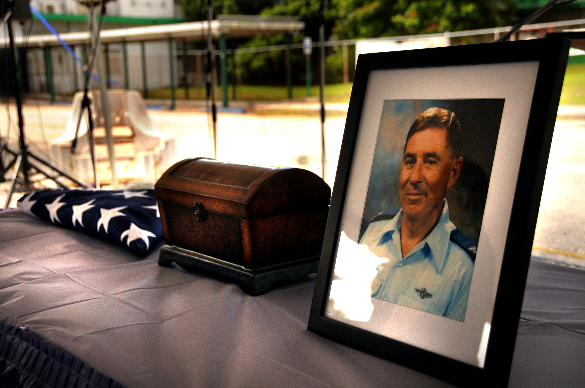 ANDERSEN AIR FORCE BASE, Guam - Retired United States Air Force Col. Walter "Tony" Merritt is honored by a memorial service at John F. Kennedy High School in Tammuning, Guam, Oct. 4. Colonel Merritt retired from active duty in 1979 but never left the service. He gave back to the community by serving 28 years as a Junior Reserve Officer Training Corps instructor at JFK High School and as liaison officer to the Air Force Academy. (U.S. Air Force photo by Airman 1st Class Courtney Witt)