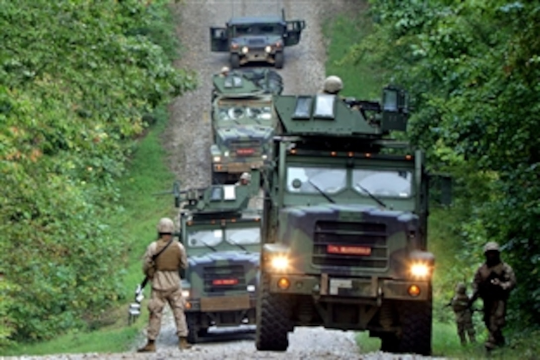 U.S. Marines assigned to the Combat Logistics Battalion 22, 22nd Marine Expeditionary Unit, conduct a security stop during improvised explosive device convoy training Sept. 29, 2008, on  Fort Pickett, Va.