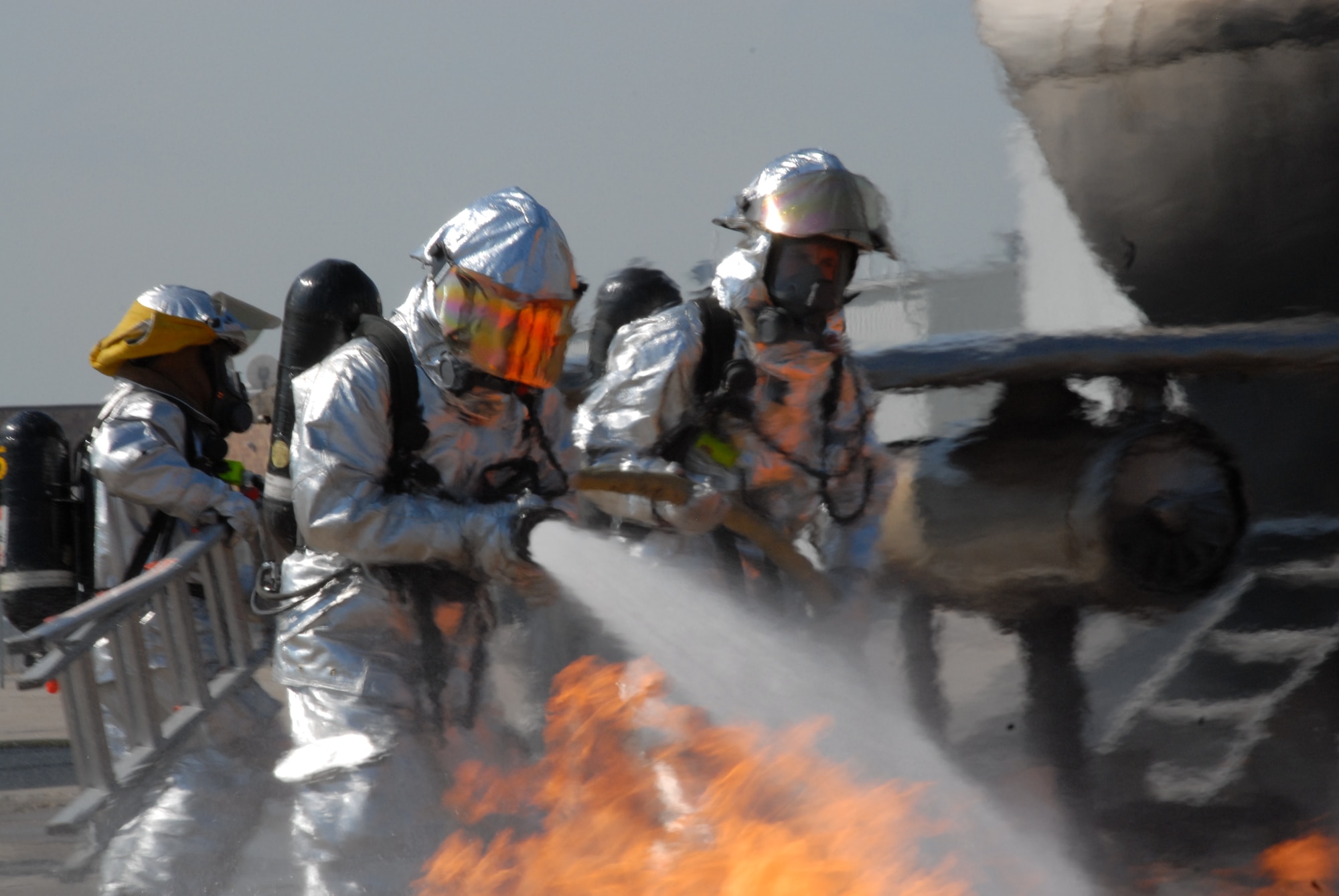 August 26, 2008, Sioux City, IA.- Firemen from the 185th Air Refueling Wing, Iowa Air National Guard, in Sioux City Iowa conduct their mandatory annual training on a mock-up downed jet. The training jet is brought from the University of Missouri and is used for fireman training to apply their knowledge to scenarios set up for downed aircraft. The training is a requirement by the Guard Bureau and the Federal Aviation Administration.

Official Air Force Photo by: Oscar M. Sanchez-Alvarez
