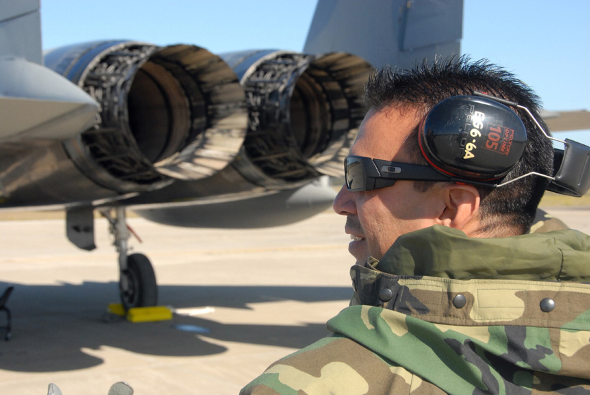 WILLIAMTOWN, AUSTRALIA -- Master Sgt. Paul Tan of the 154th Wing Maintenance Group supervises preflight operations during Sentry Down Under in Williamtown, Australia.