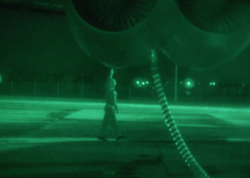 An aircrew member from the 23rd Bomb Squadron performs flight checks of the B-52 at Minot Air Force Base, N.D., the morning of the Weapon System Evaluation Program mission.  After the checks are complete, the aircraft is launched for an approximately five hour mission to the Utah Test and Training Range and back.  Three months of preparation and hundreds of man-hours come down to the critical five hour flight.  Photo by Senior Airman Joe Rivera.  