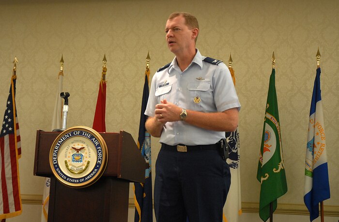 Col. John "Red" Millander addresses more than 250 retirees and family members at the Charleston AFB and Naval Weapons Station Charleston Military Retiree and Spouse Appreciation Day Oct. 4 at the Charleston Club. The military retiree appreciation day is held annually to inform retirees and their family members about up-to-date information offered on the military installations. Colonel Millander is the 437th Airlift Wing commander. (U.S. Air Force photo/Master Sgt. Paul Kilgallon)