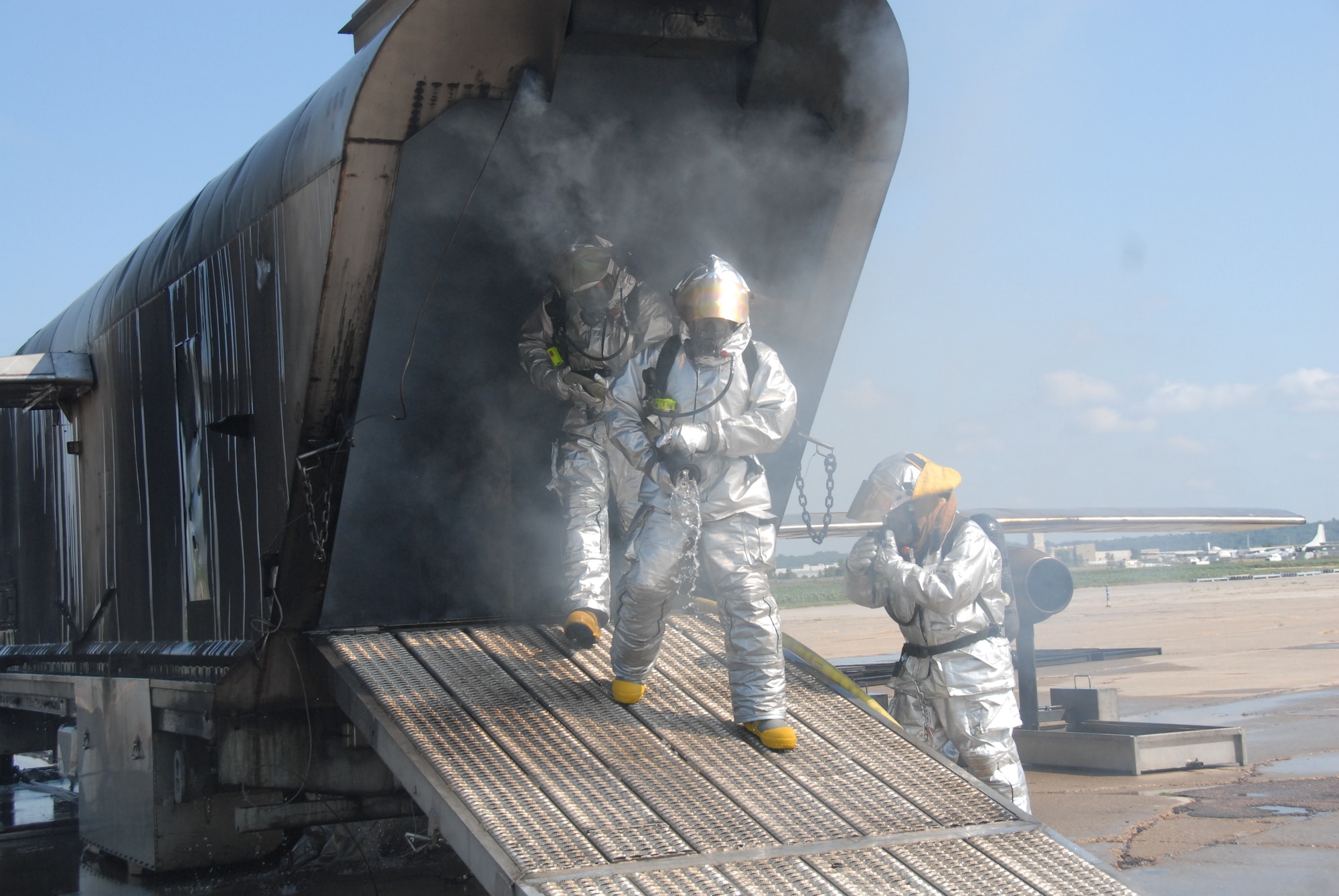 August 26, 2008, Sioux City, IA.- Firemen from the 185th Air Refueling Wing, Iowa Air National Guard, in Sioux City Iowa conduct their mandatory annual training on a mock-up downed jet. The training jet is brought from the University of Missouri and is used for fireman training to apply their knowledge to scenarios set up for downed aircraft. The training is a requirement by the Guard Bureau and the Federal Aviation Administration.

Official Air Force Photo by: Oscar M. Sanchez-Alvarez
