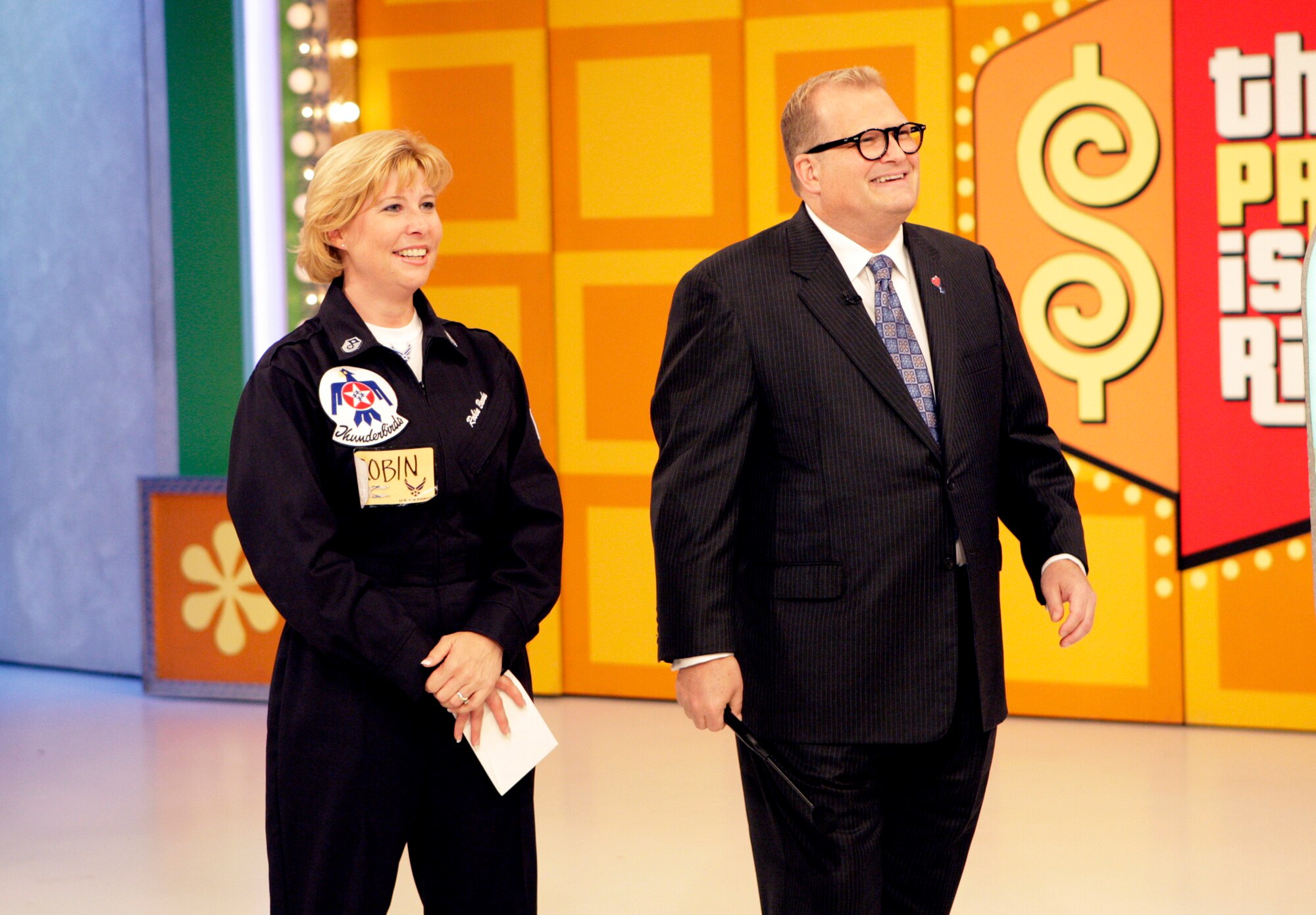LOS ANGELES, Calif. – Master Sgt. Robin Brooks, first sergeant for the Thunderbirds at Nellis Air Force Base, stands with Drew Carey, host of the game show “The Price is Right,” Sept. 10, 2008. Sergeant Brooks was a contestant in a “Salute to the Military” episode of The Price is Right that is scheduled to air on Veteran’s Day, Nov. 11.