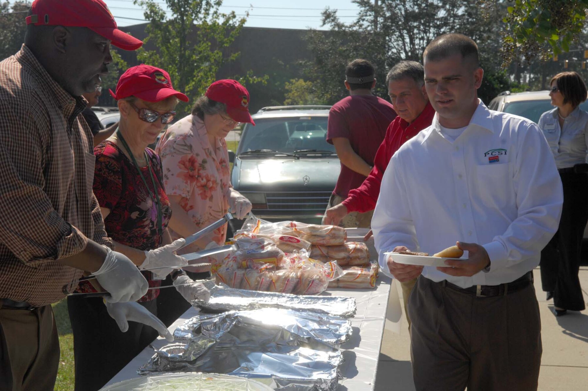 SHAW AIR FORCE BASE, S.C. -- Retired Army Specialist Nathan Short goes through the buffet line before he speaks on how Ability One helped him after he was severely injured in Operation Iraqi Freedom during the Ability One Appreciation Picnic Oct. 8. Ability One provides jobs for disabled personnel on military installations throughout the country. (U.S. Air Force photo/Senior Airman Matthew Davis)