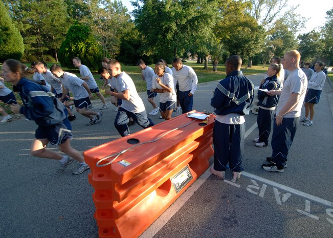 Participants begin the run portion of the Commander's Fitness Challenge in the first heat of the 1.5-mile run behind the Charleston AFB fitness center Oct. 3. The Commander's Fitness Challenge is held monthly to promote fitness and esprit de corps. (U.S. Air Force photo/Airman 1st Class Timothy Taylor)
