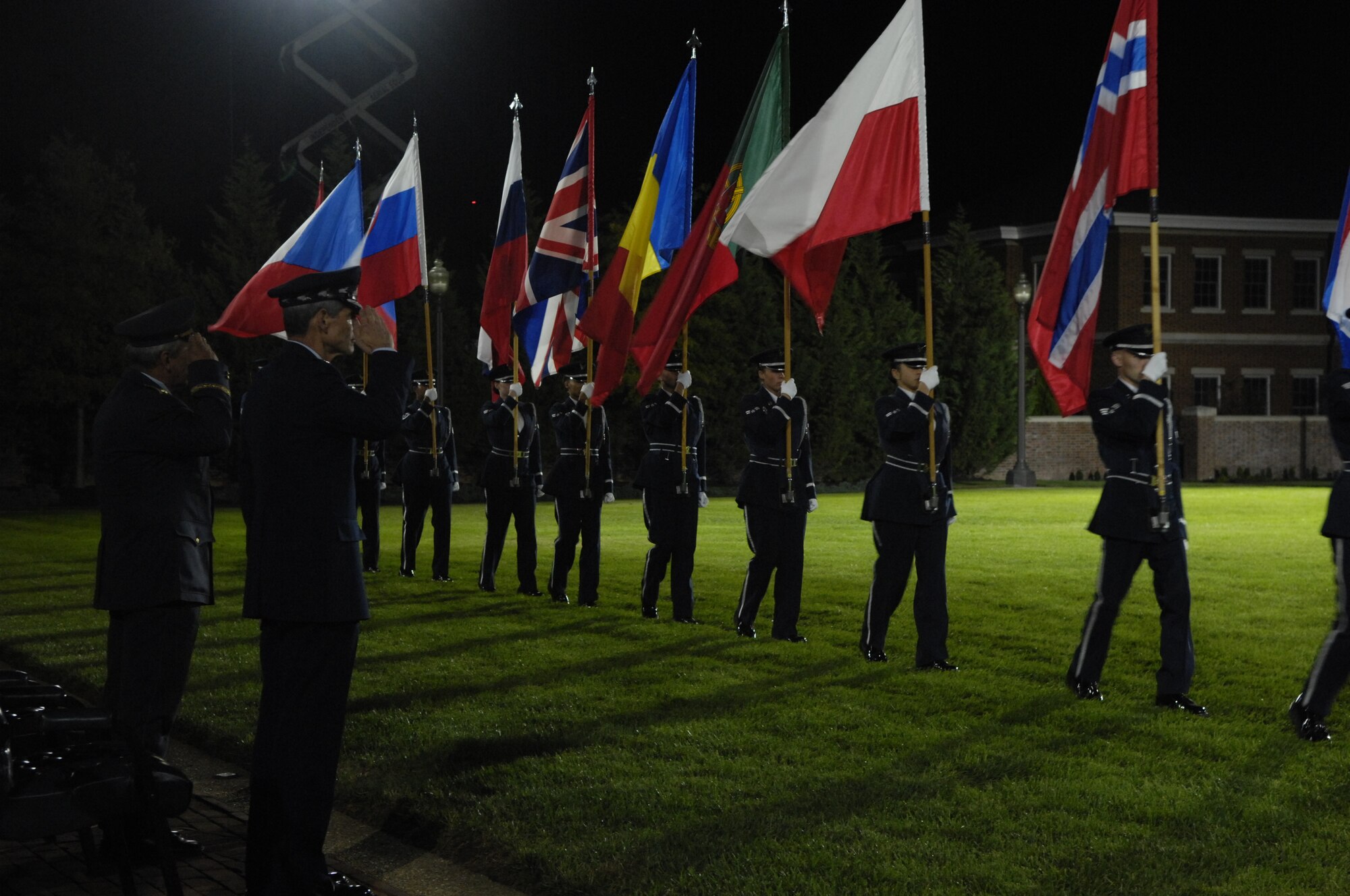 Maj. Gen. Ladislav Minarik, Senior NATO Air Chief Conference representative, of the Czech Republic, and U.S. Air Force Chief of Staff Gen. Norton A. Schwartz, salute during the NATO pass in review during the Tattoo on Bolling's Ceremonial Lawn Oct. 6. The Tattoo, themed "Securing Our Freedom," was held in conjunction with the 2008 NATO Air Chiefs' Conference hosted by General Schwartz. (U.S. Air Force photo by Senior Airman Marleah Miller) (Released)