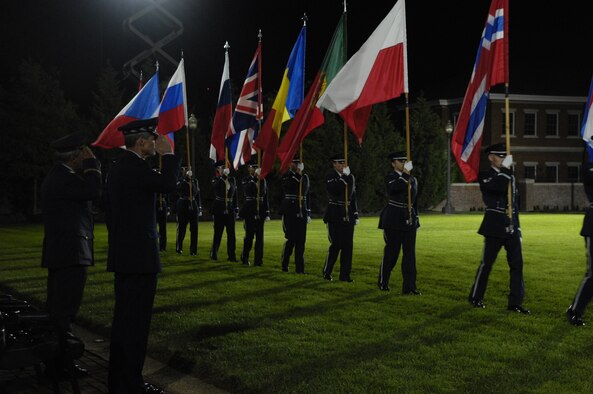 Senior NATO Air Chief Conference representative Maj. Gen. Ladislav Minarik of the Czech Republic and U.S. Air Force Chief of Staff Gen. Norton A. Schwartz, salute during the NATO pass in review during the Tattoo on Bolling Oct. 6. The Tattoo, themed "Securing Our Freedom," was held in conjunction with the 2008 NATO Air Chiefs Conference hosted by General Schwartz. (U.S. Air Force photo by Senior Airman Marleah Miller) (Released) 
