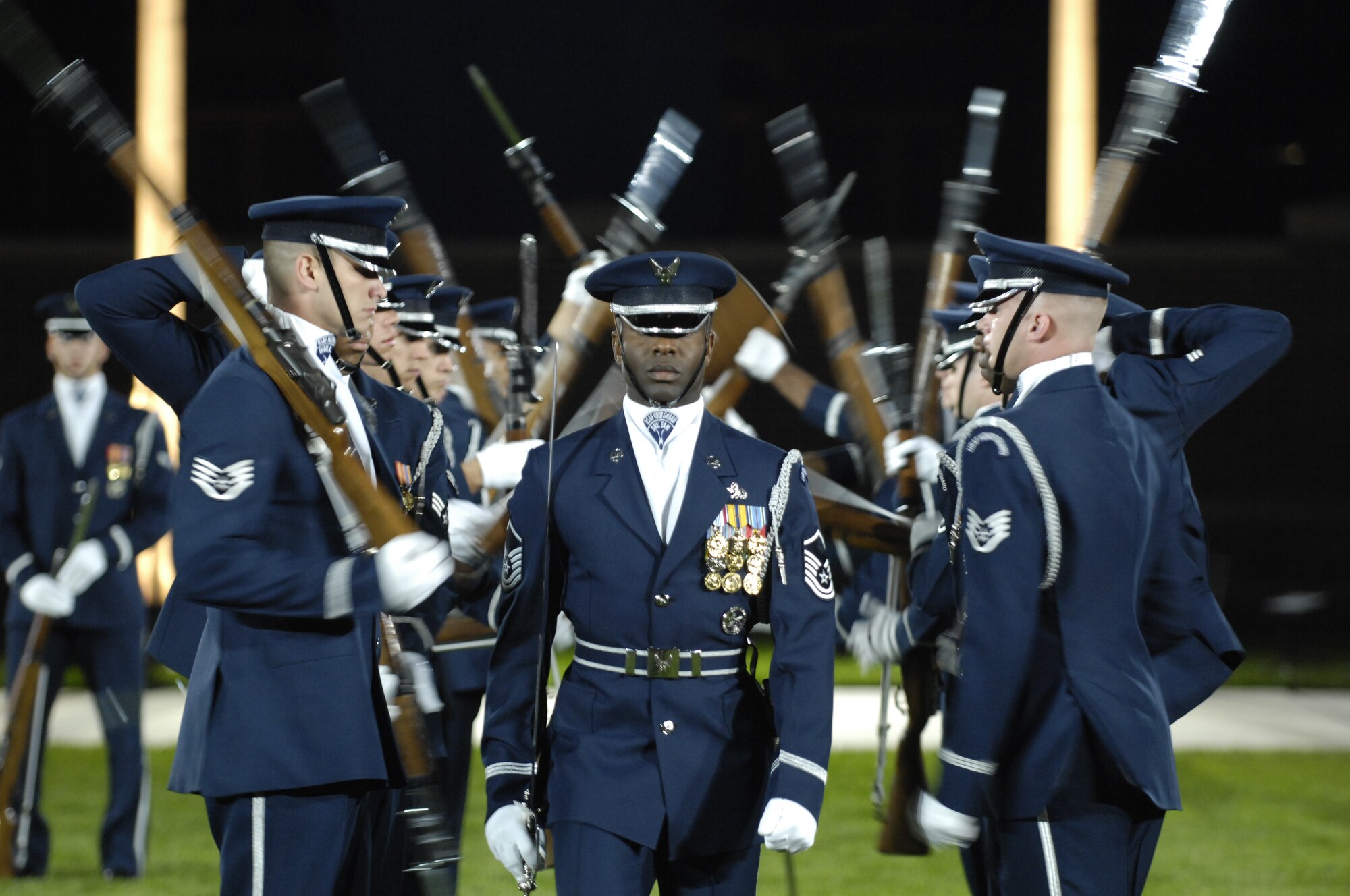 Members of the U.S. Air Force Honor Guard Drill team perform during their rehearsal Tattoo on Bolling Oct. 5. The tattoo, themed "Securing Our Freedom," was presented in conjunction with the 2008 NATO Air Chiefs' Conference, hosted by Gen. Norton A. Schwartz, Air Force chief of staff.  (U.S. Air Force photo by Senior Airman Marleah Miller) (Released)