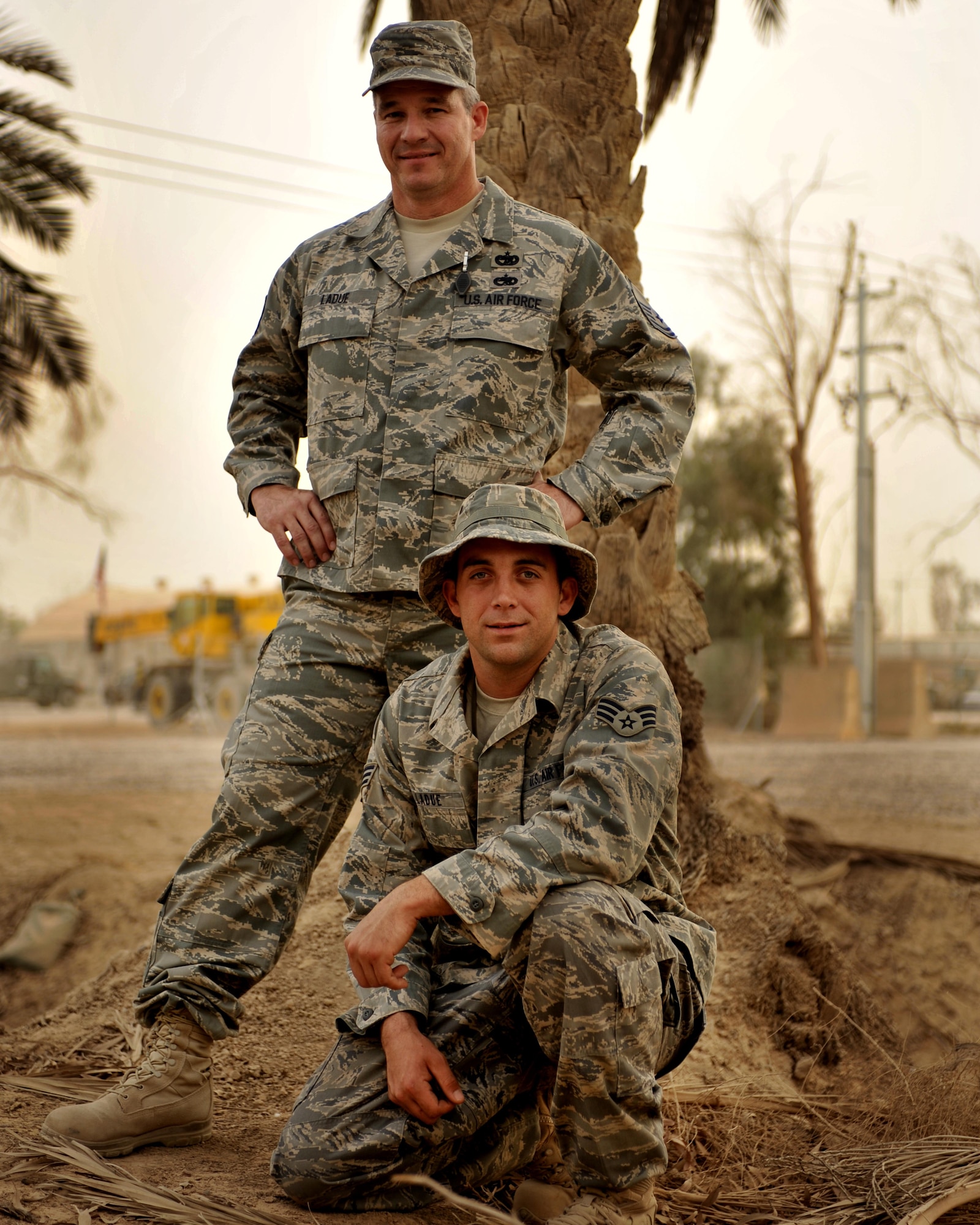 10/01/2008 ? BAGHDAD INTERNATIONAL AIRPORT, Iraq - Master Sgt. Patrick LaDue and his youngest son, Senior Airman Gabriel LaDue, had the opportunity to spend a couple of days together in Iraq as Airman LaDue was heading home after completing a deployment with the 557th Expeditionary Red Horse Squadron at Forward Operating Base Hammer. Sergeant LaDue is assigned to the 447th Expeditionary Logistics Readiness Squadron at Sather Air Base in Baghdad from the Tennessee Air National Guard?s 134th Air Refueling Wing in Knoxville. The LaDue family has a long history of militray service dating all the way back to the Civil War.  (U.S. Air Force photo by Master Sgt. Brian Davidson) 