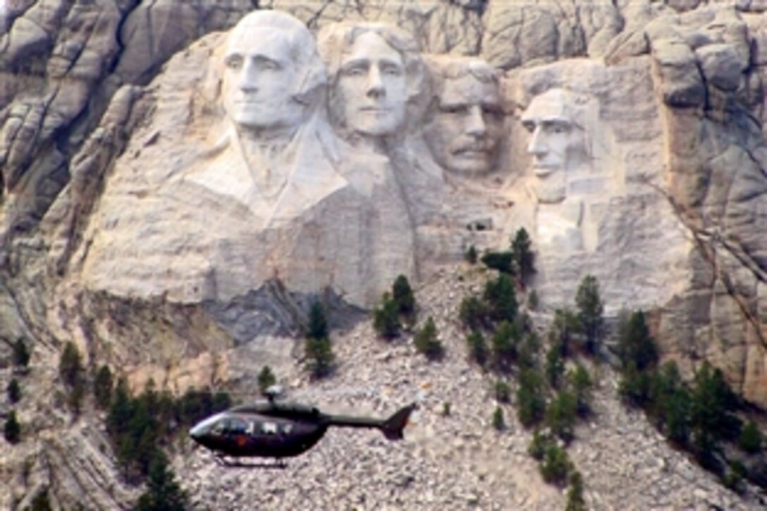 A UH-72 Lakota Light Utility Helicopter from Fort Polk, La., flies past Mount Rushmore on its way to the Lakota powwow in South Dakota, Sept. 23, 2008. At the Lakota Sioux tribe's request, the helicopter series was given the tribe's name. 