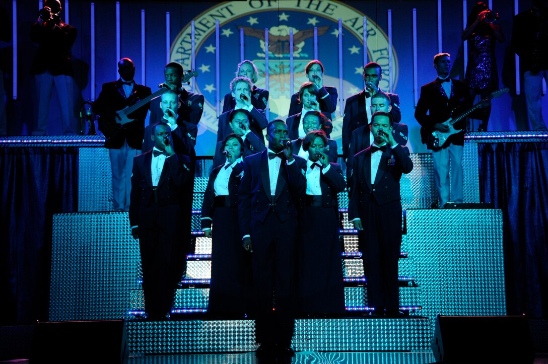 Tops in Blue vocalists ended their performance singing the Airman's Creed Oct. 2 at Lajes Field, Azores.  Tops in Blue perform for military personnel and their families worldwide.  (U.S. Air Force photo/Tech. Sgt. Rebecca F. Corey)