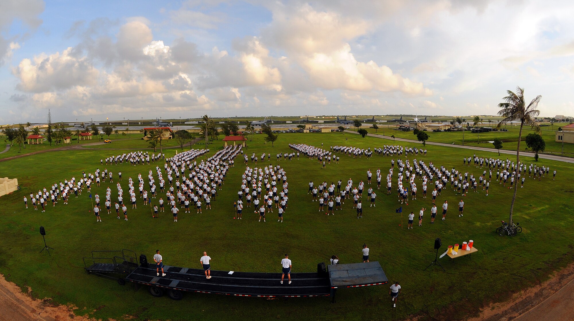 ANDERSEN AIR FORCE BASE, Guam - Master Sgt. Anthony Cruz-Munoz, 36th Civil Engineer Squadron first sergeant, leads Team Andersen members in warm-up stretches before the monthly wing run here Oct. 10. The run emphasizes physical training while promoting esprit de corps. Every squadron on Andersen is represented in individual formations led by its commander or first sergeant. (U.S. Air Force photo by Airman 1st Class Courtney Witt)