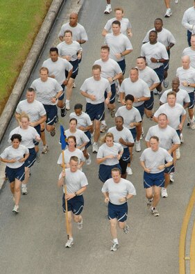 ANDERSEN AIR FORCE BASE, Guam - Team Andersen members led by Brig. Gen. Phil Ruhlman, 36th Wing commander, participate in the monthly wing run here Oct. 10. Andersen's monthly wing run is approximately 1.5 miles and emphasizes physical training while promoting esprit de corps.(U.S. Air Force photo by Airman 1st Class Nichelle Griffiths)