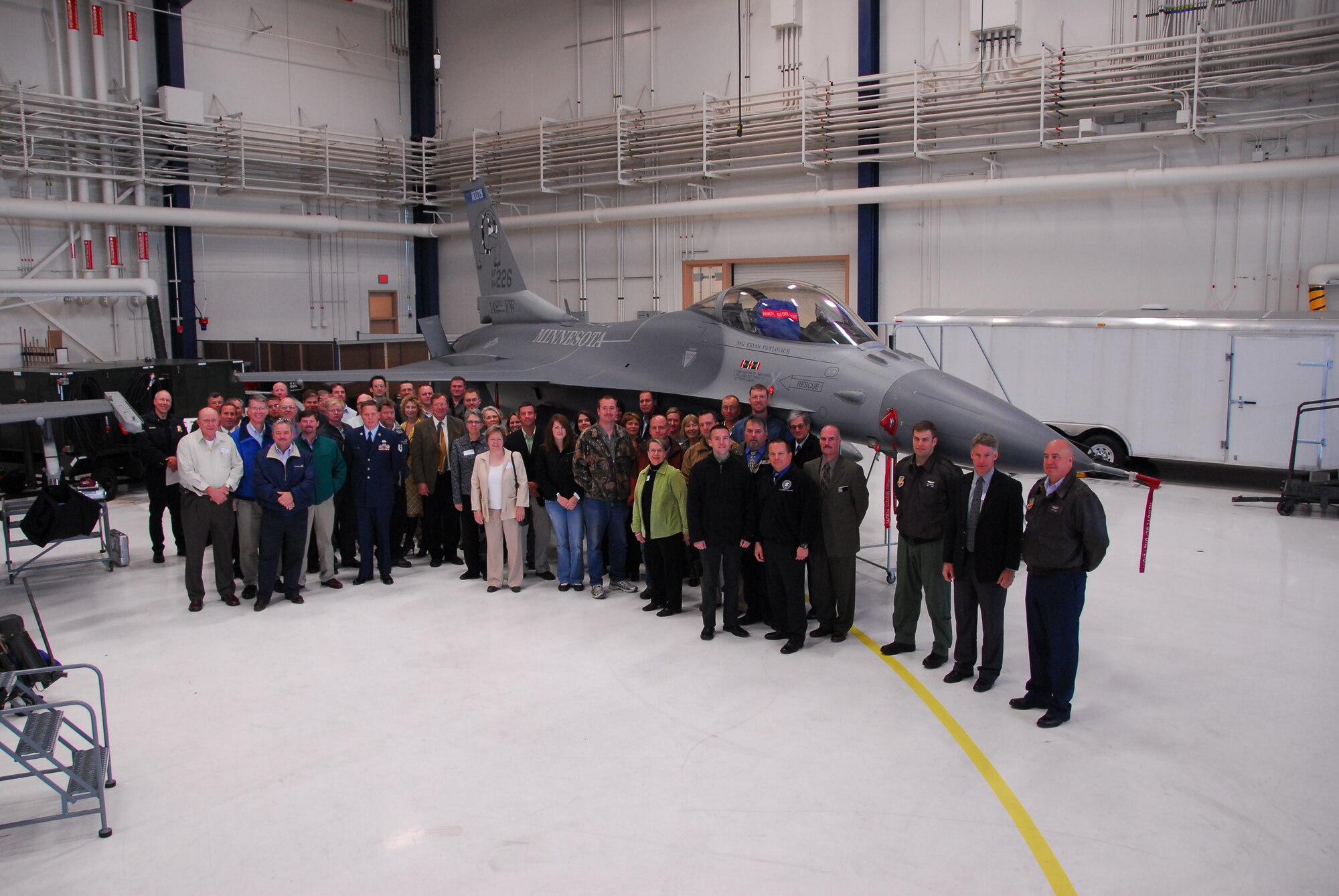 Airmen from the 148th Fighter Wing and their civilian employers participate in an Employer Support of the Guard and Reserve (ESGR) breakfast at the Duluth, Minn. Air National Guard base October 9th, 2008.  The event promoted cooperation and understanding between Guard members and their civilian employers.  (U.S. Air Force photo by Capt. Audra Flanagan) (Released) 