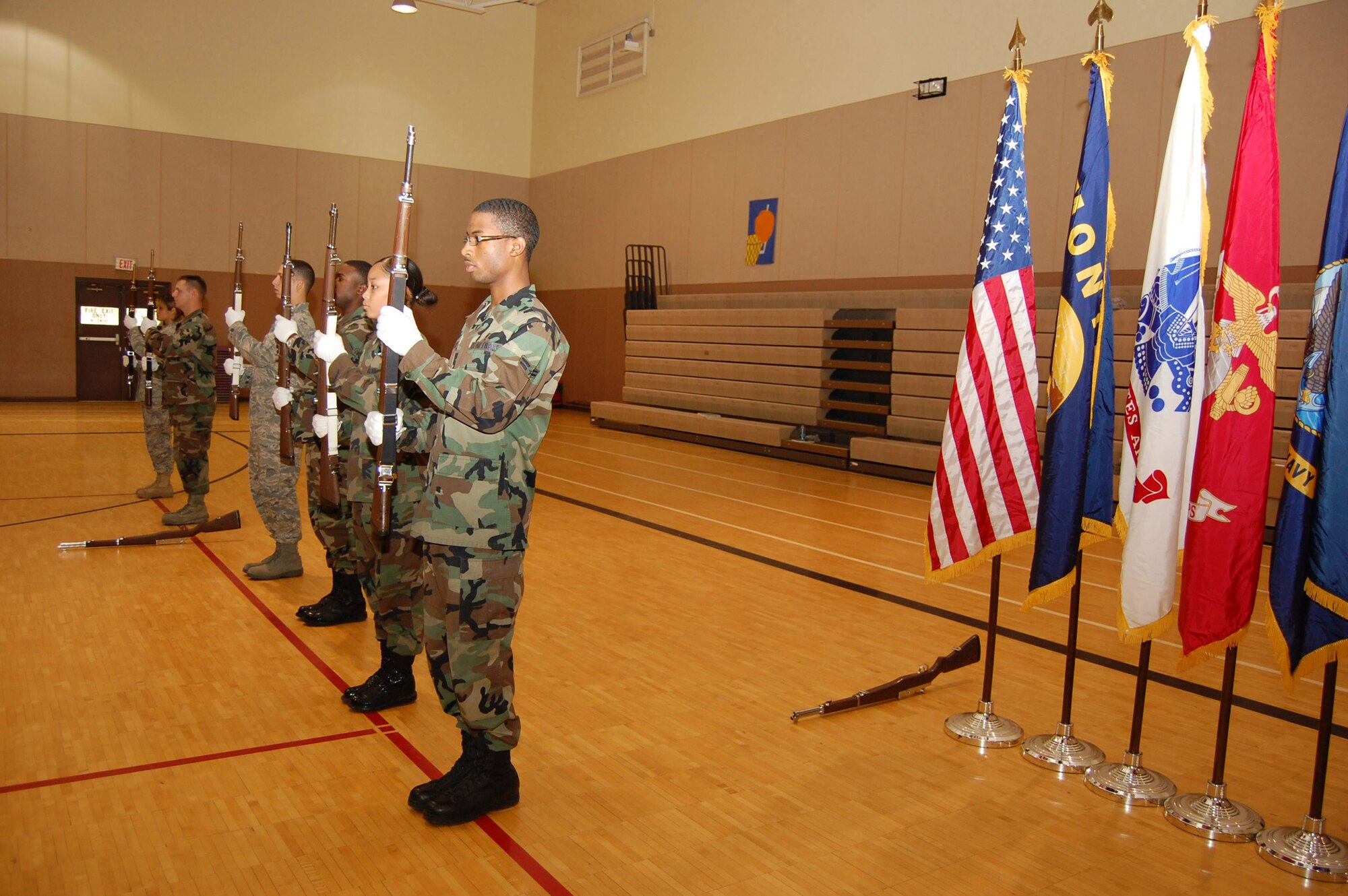New members of the Honor Guard practice their techniques in the lower gym Oct. 2, the day before a graduation and mock funeral was performed by the 18 new members of the Honor Guard. (U.S. Air Force photo/Senior Airman Emerald Ralston)