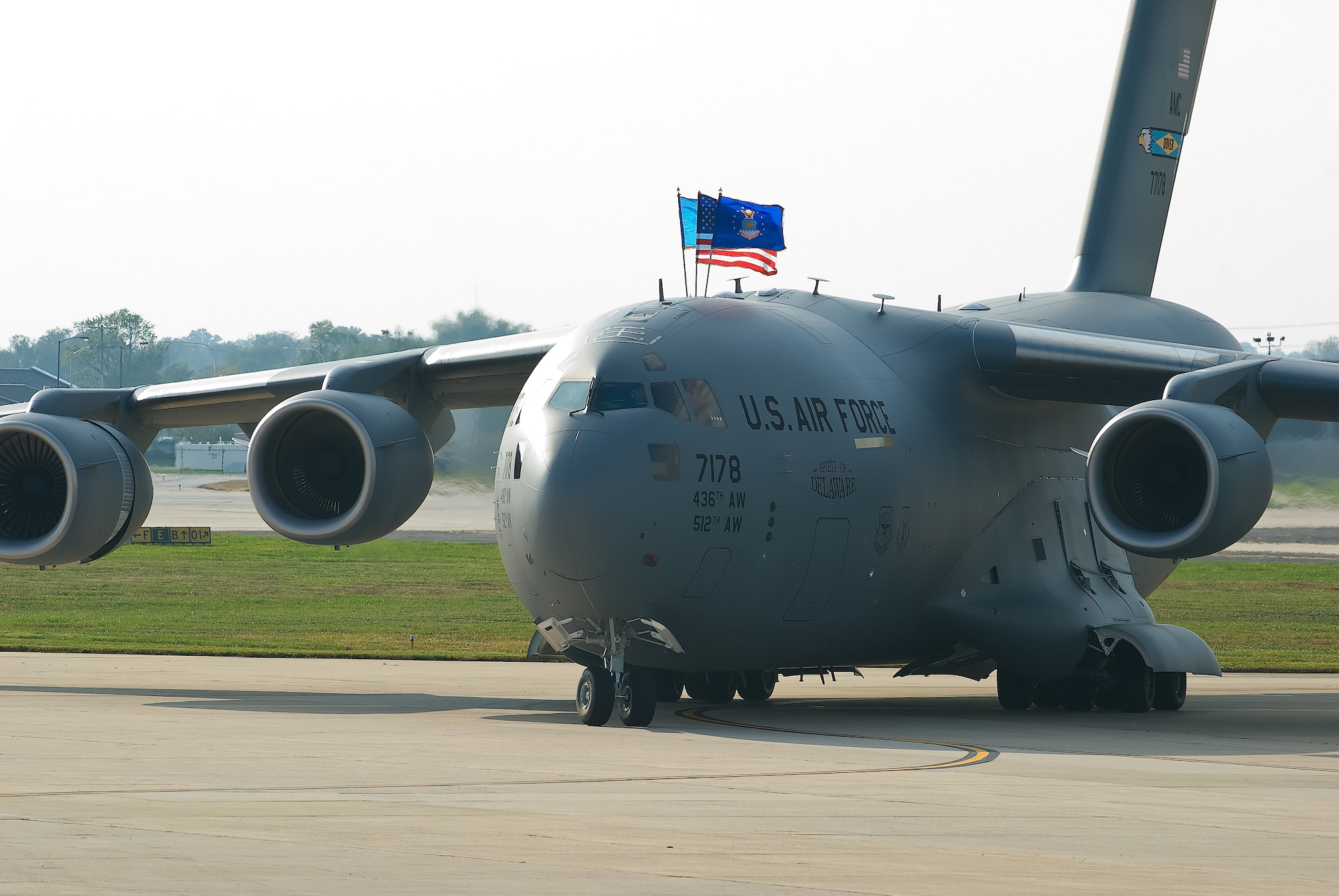 The Spirit of Delaware, Dover's 13th and final C-17 Globemaster III, arrives at the Air Mobility Command Museum Oct. 8.  Gen. Arthur Lichte, AMC commander, served as the delivery official for Dover's last assigned C-17.  (U.S. Air Force photo Roland Balik)