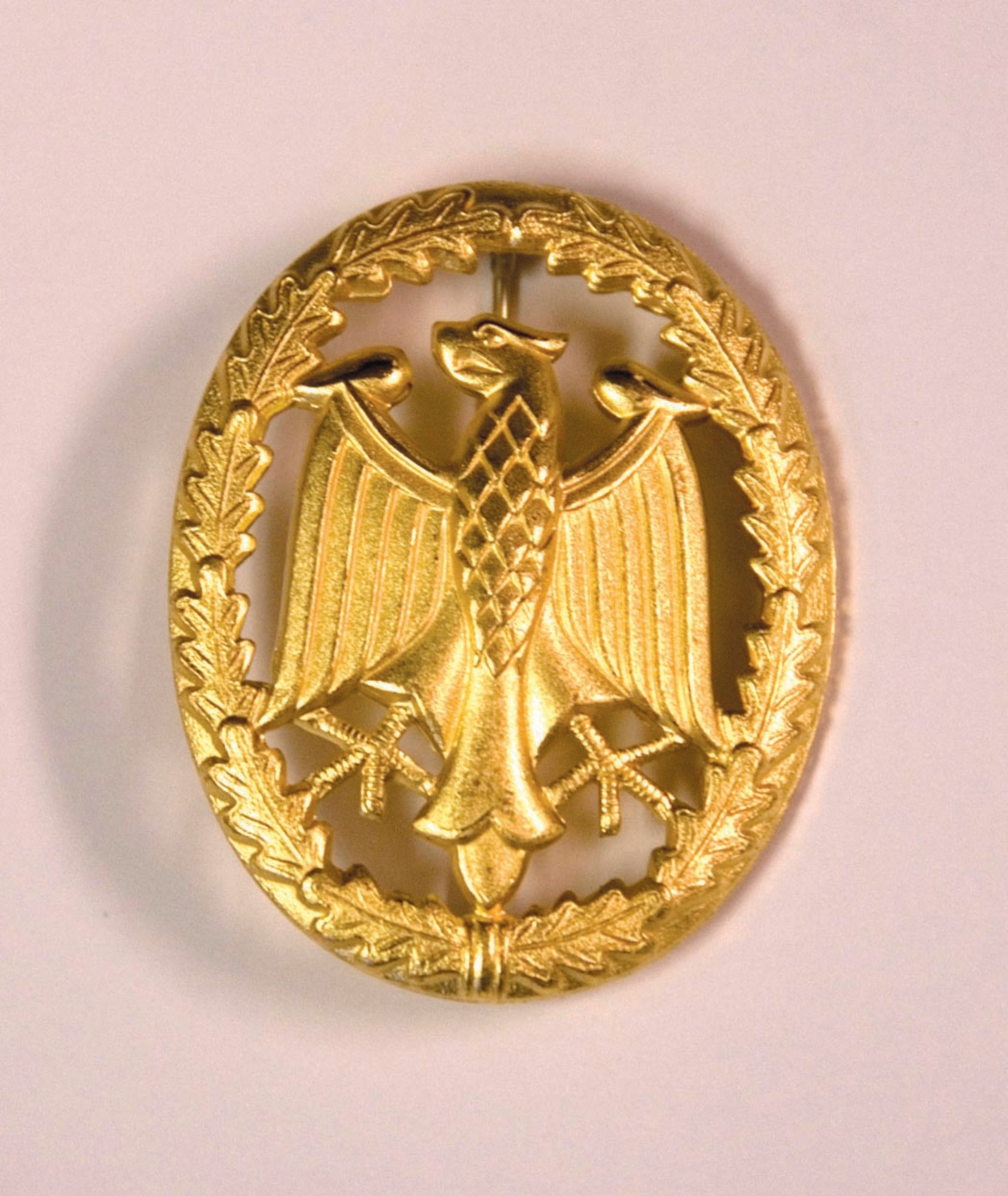 The gold German Armed Forces, Troop Duty Proficiency Badge was awarded to the 316th Security Forces Squadron Ravens after a 25K march.  The badge is worn 1/2 inch above and centered on the Airman’s nametag. .   (USAF photo by Tech. Sgt. Adrianne M. Wilson)