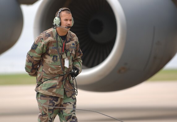 Tech. Sgt. Billy Martin, a crew chief assigned to the 931st Aircraft Maintenance Squadron, helps with the recovery of a KC-135 Stratotanker that returned from a mission during the 931st Air Refueling Group's September Unit Training Assembly. Plans to expand Sergeant Martin's squadron are close to final. (U.S. Air Force photo/Tech. Sgt. Jason Schaap) 