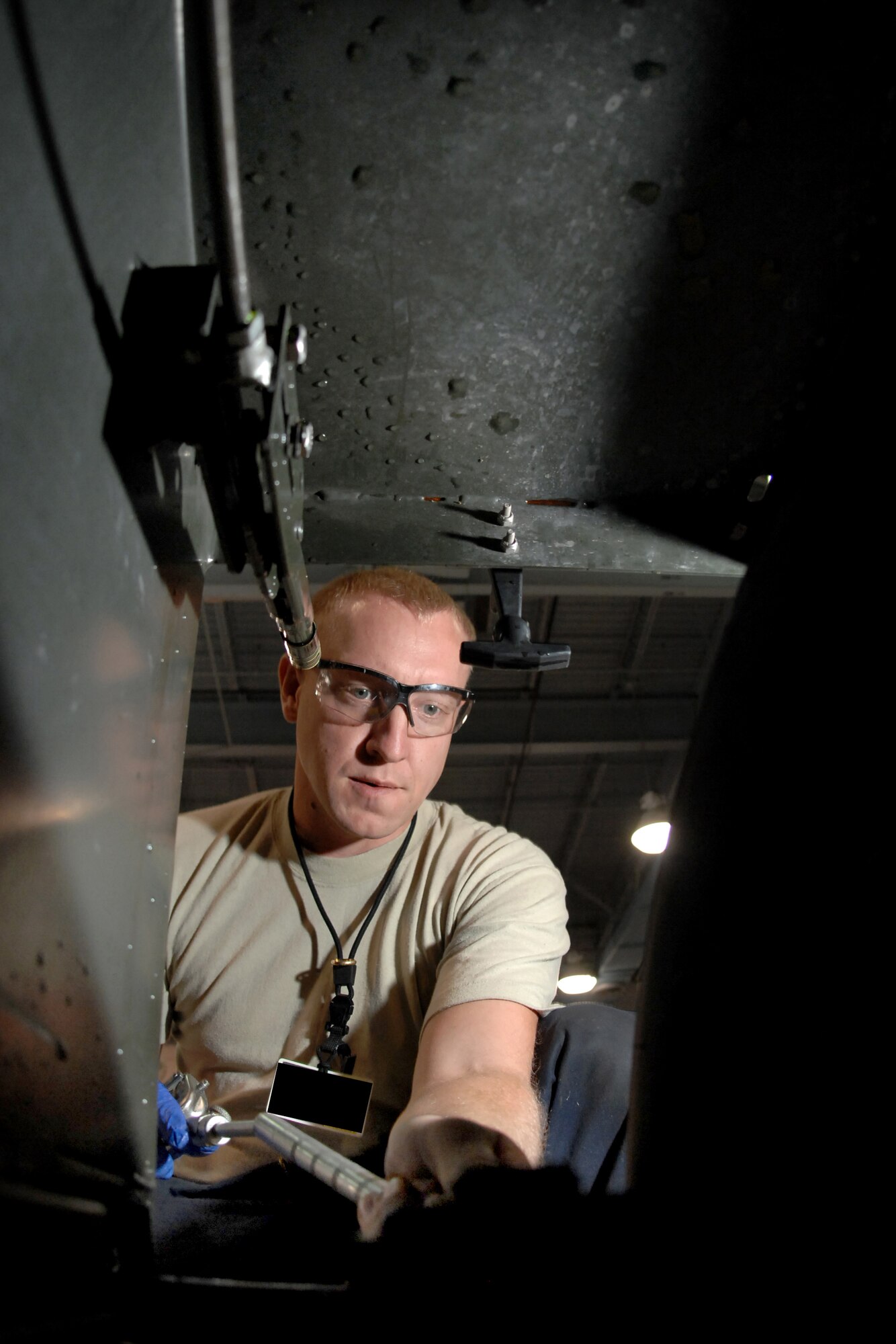 OFFUTT AIR FORCE BASE, Neb. -- Staff Sgt. Shane Ott, an aerospace ground equipment mechanic assigned to the 55th Maintenance Squadron here, goes through a phase one inspection on a self generating nitrogen cart, Oct. 1. The cart is used to inflate both tires and struts on various aircraft. (U.S. Air Force Photo By Josh Plueger)