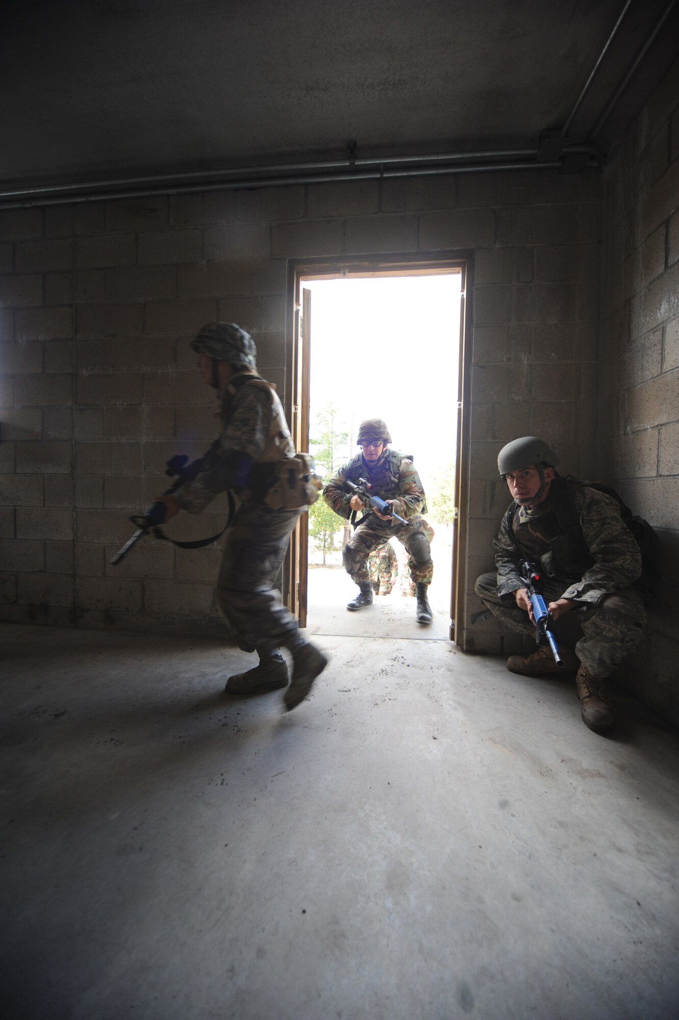 Students partcipate in functional-specific training for the Air Force legal career field on a Fort Dix, N.J., range Oct. 1, 2008.  The functional-specific training for the students of the Air Force legal career field focuses on contingency skills basics, rules of use of force, rules of engagement and expeditionary basics for legal Airmen on deployment. The training is held for three days prior to them attending the Advanced Contingency Skills Training Course taught by the U.S. Air Force Expeditionary Center's 421st Combat Training Squadron on Fort Dix.  (U.S. Air Force Photo/Staff Sgt. Nathan Bevier)