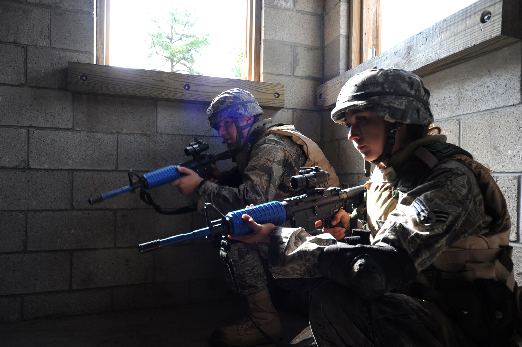Students partcipate in functional-specific training for the Air Force legal career field on a Fort Dix, N.J., range Oct. 1, 2008.  The functional-specific training for the students of the Air Force legal career field focuses on contingency skills basics, rules of use of force, rules of engagement and expeditionary basics for legal Airmen on deployment. The training is held for three days prior to them attending the Advanced Contingency Skills Training Course taught by the U.S. Air Force Expeditionary Center's 421st Combat Training Squadron on Fort Dix.  (U.S. Air Force Photo/Staff Sgt. Nathan Bevier)
