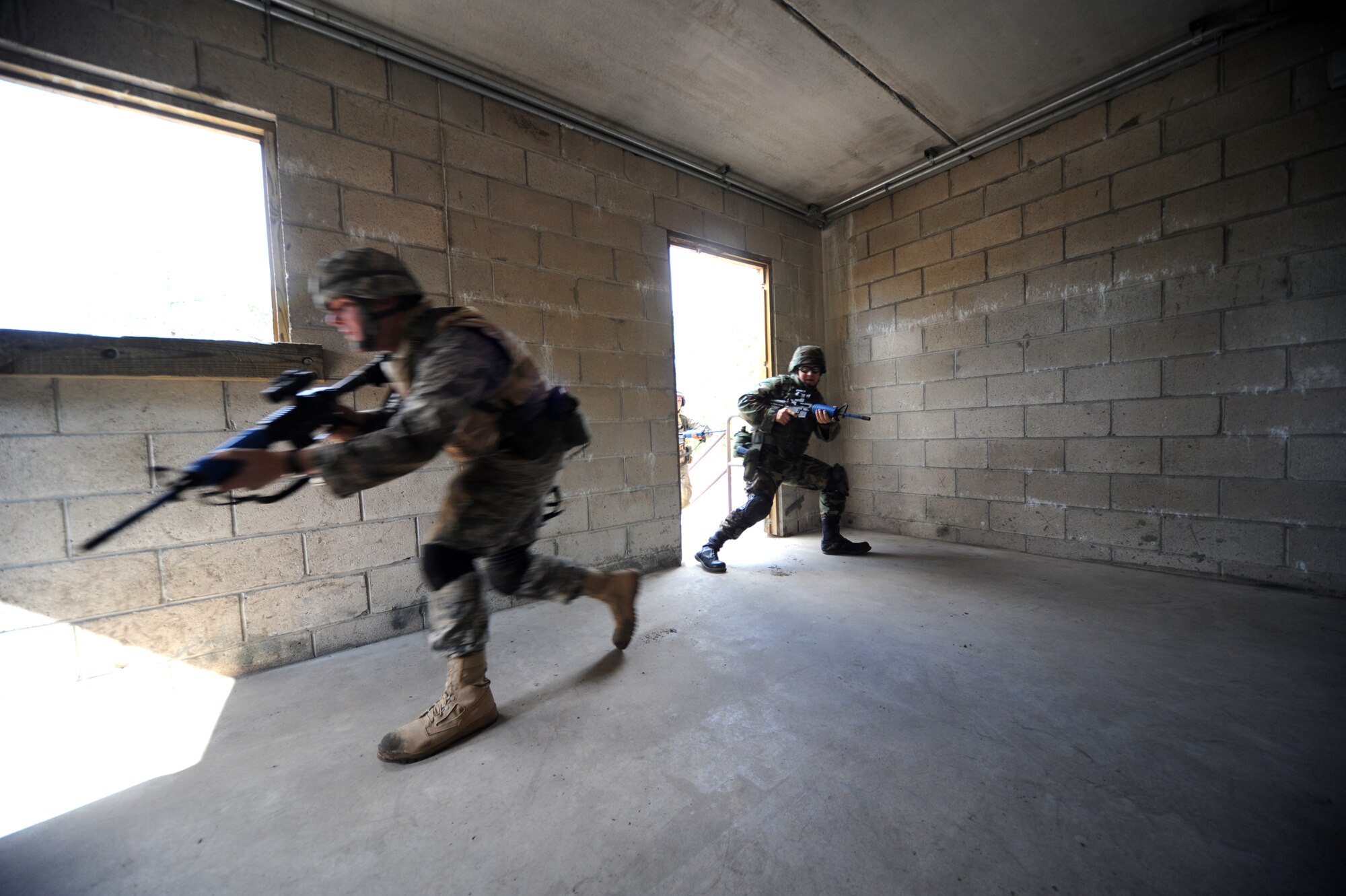 Students partcipate in functional-specific training for the Air Force legal career field on a Fort Dix, N.J., range Oct. 1, 2008.  The functional-specific training for the students of the Air Force legal career field focuses on contingency skills basics, rules of use of force, rules of engagement and expeditionary basics for legal Airmen on deployment. The training is held for three days prior to them attending the Advanced Contingency Skills Training Course taught by the U.S. Air Force Expeditionary Center's 421st Combat Training Squadron on Fort Dix.  (U.S. Air Force Photo/Staff Sgt. Nathan Bevier)