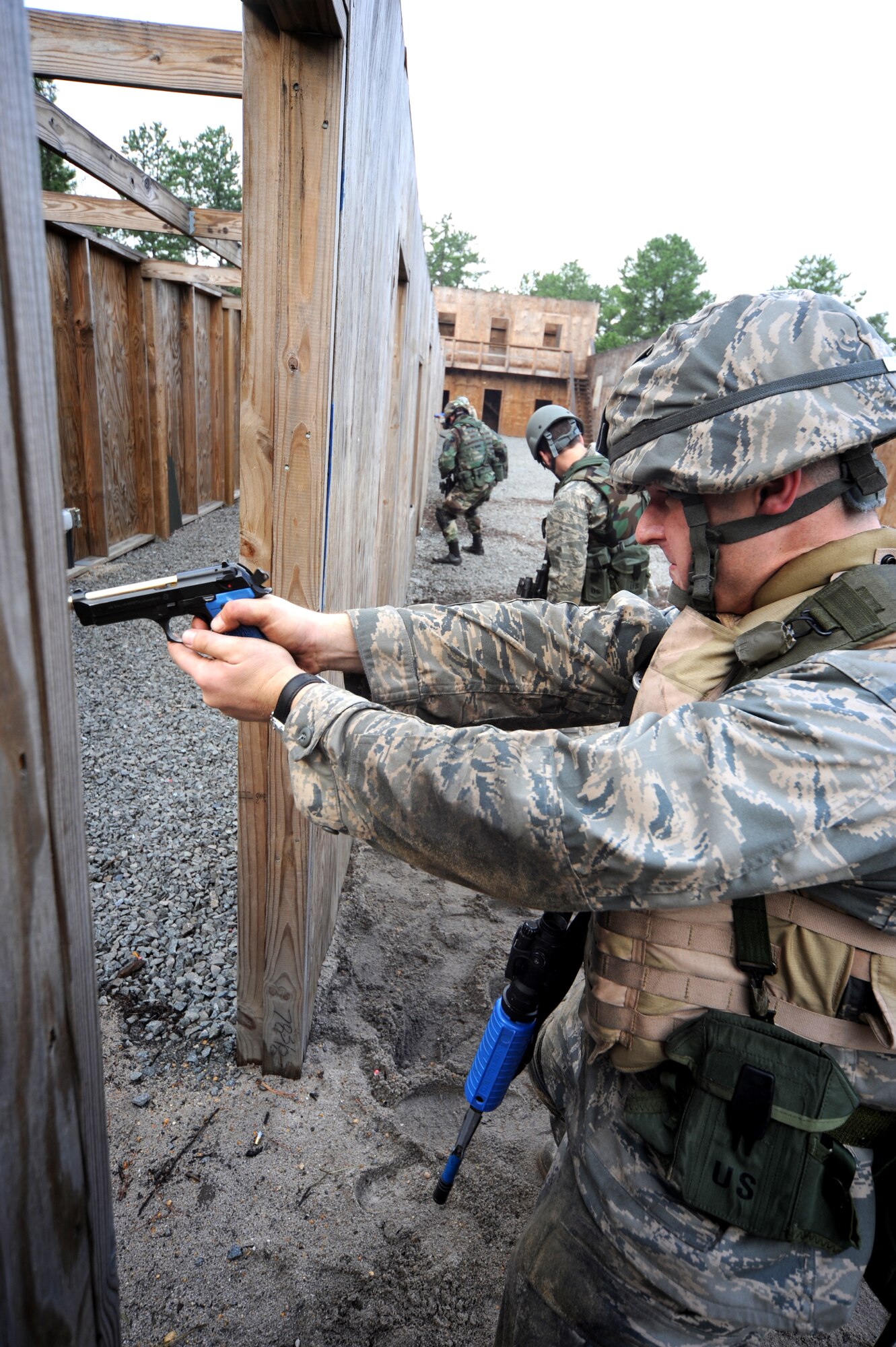 Students partcipate in functional-specific training for the Air Force legal career field on a Fort Dix, N.J., range Oct. 1, 2008.  The functional-specific training for the students of the Air Force legal career field focuses on contingency skills basics, rules of use of force, rules of engagement and expeditionary basics for legal Airmen on deployment. The training is held for three days prior to them attending the Advanced Contingency Skills Training Course taught by the U.S. Air Force Expeditionary Center's 421st Combat Training Squadron on Fort Dix.  (U.S. Air Force Photo/Staff Sgt. Nathan Bevier)