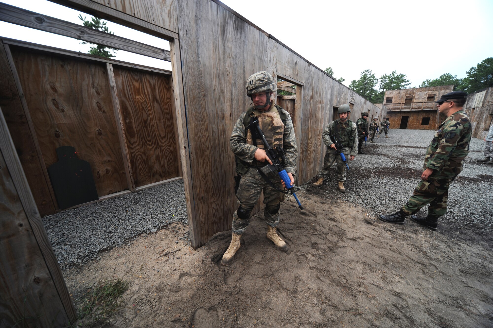 Tech. Sgt. Keith Vershay (right), U.S. Air Force Expeditionary Center contingency skills training instructor and an Air Force paralegal, oversees students partcipate in functional-specific training for the Air Force legal career field on a Fort Dix, N.J., range Oct. 1, 2008.  The functional-specific training for the students of the Air Force legal career field focuses on contingency skills basics, rules of use of force, rules of engagement and expeditionary basics for legal Airmen on deployment. The training is held for three days prior to them attending the Advanced Contingency Skills Training Course taught by the U.S. Air Force Expeditionary Center's 421st Combat Training Squadron on Fort Dix.  (U.S. Air Force Photo/Staff Sgt. Nathan Bevier)