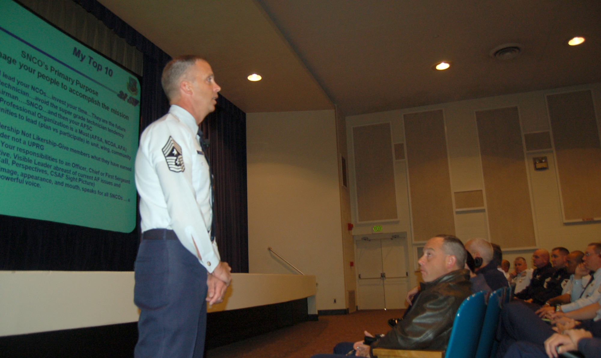 Chief Master Sgt. Tim Omdal, 21st Space Wing command chief, explains his expectations for senior noncommissioned officers at a 21 SW SNCO call at the base auditorium Oct. 6. The event was part of Air Force Space Command’s Year of Leadership. (Air Force photo/Corey Dahl) 