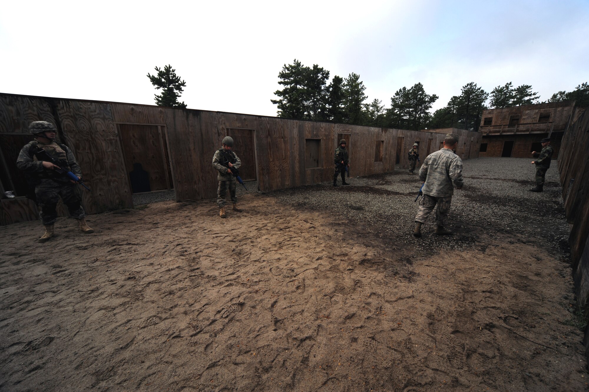 Students partcipate in functional-specific training for the Air Force legal career field on a Fort Dix, N.J., range Oct. 1, 2008.  The functional-specific training for the students of the Air Force legal career field focuses on contingency skills basics, rules of use of force, rules of engagement and expeditionary basics for legal Airmen on deployment. The training is held for three days prior to them attending the Advanced Contingency Skills Training Course taught by the U.S. Air Force Expeditionary Center's 421st Combat Training Squadron on Fort Dix.  (U.S. Air Force Photo/Staff Sgt. Nathan Bevier)