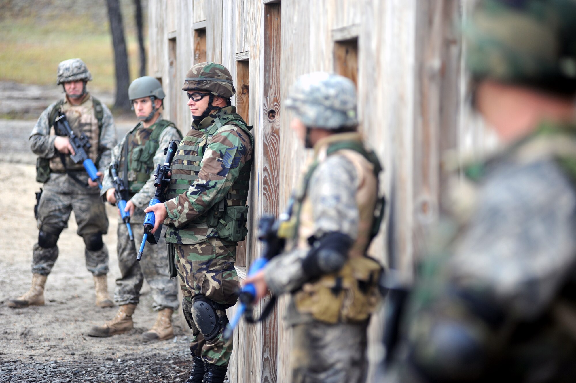 Students partcipate in functional-specific training for the Air Force legal career field on a Fort Dix, N.J., range Oct. 1, 2008.  The functional-specific training for the students of the Air Force legal career field focuses on contingency skills basics, rules of use of force, rules of engagement and expeditionary basics for legal Airmen on deployment. The training is held for three days prior to them attending the Advanced Contingency Skills Training Course taught by the U.S. Air Force Expeditionary Center's 421st Combat Training Squadron on Fort Dix.  (U.S. Air Force Photo/Staff Sgt. Nathan Bevier)