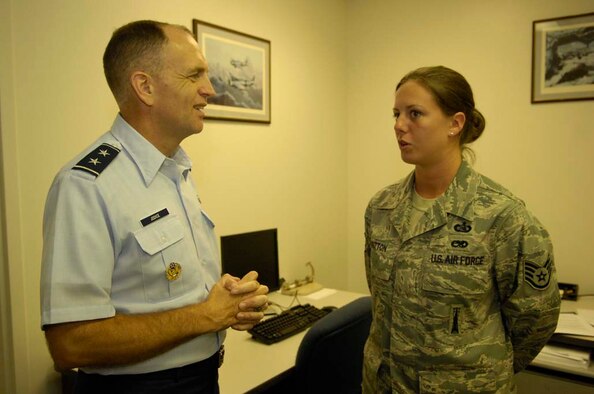 Maj. Gen. Ralph J. Jodice II (left), 320th Air Expeditionary Wing and Air Force District of Washington commander, meets with Staff Sgt. Angela R. Britton, Information Technology Support Technician. Sergeant Britton, from the 509th Communications Squadron at Whiteman Air Force Base, Mo., is deployed with the 320th AEW at Andrews AFB, Md., to support the 2009 presidential inauguration as part of the 56th Armed Forces Inaugural Committee. (U.S. Air Force photo)