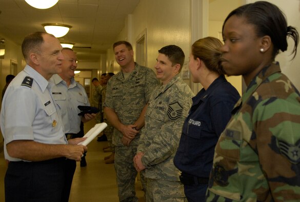 Maj. Gen. Ralph J. Jodice II (left), 320th Air Expeditionary Wing and Air Force District of Washington commander meets with some of the men and women supporting the 2009 presidential inauguration as part of the 56th Armed Forces Inaugural Committee. Airmen assigned to AFIC are deployed with the 320th AEW, headquartered at Andrews Air Force Base, Md. Also pictured (l-r) are: Chief Master Sgt. Paul Wheeler, AFDW command chief; Capt. Todd Von Ins, Los Angeles AFB, Calif.; Master Sgt. Brian White, Offutt AFB, Neb.; Navy Petty Officer 1st Class Jennifer Davis, AFIC;  and Senior Airman Olayinka Olatunji, Fort Meade, Md. (U.S. Air Force photo)