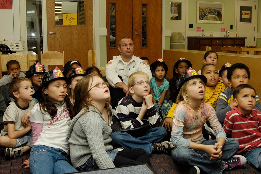 HANSCOM AFB, Mass. – Hanscom Primary School students listen to a fire safety presentation from members of the Hanscom Fire Department on Oct. 8. The Fire Department visited a number of locations across the base during Fire Prevention Week (Oct. 5 to 11), to spread the message about the importance of fire safety. (U.S. Air Force photo by Linda LaBonte Britt)