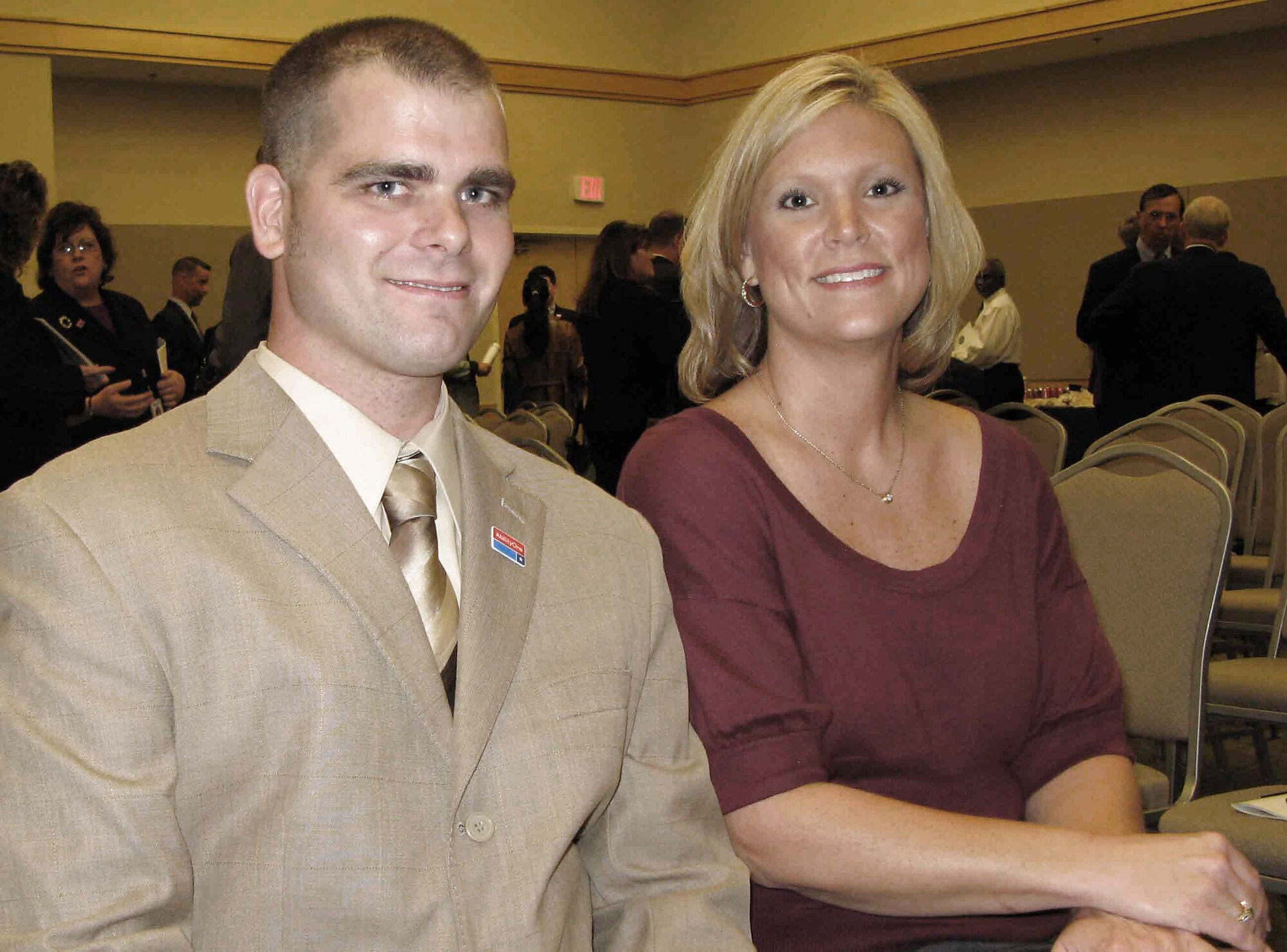 Former Army Spc. Nathan S. Short and his supervisor, Vicki Hoppes, attend a ceremony at the Pentagon Oct. 8 to recognize the contributions of disabled employees. Mr. Short is a medically-discharged Operation Iraqi Freedom veteran who was severely injured on April 20, 2004, during a truck accident in Kuwait. In 2006, he was hired for an AbilityOne-affiliated contracted position as a truck-fleet manager at Tinker Air Force Base, Okla. (DOD photo/Gerry J. Gilmore)