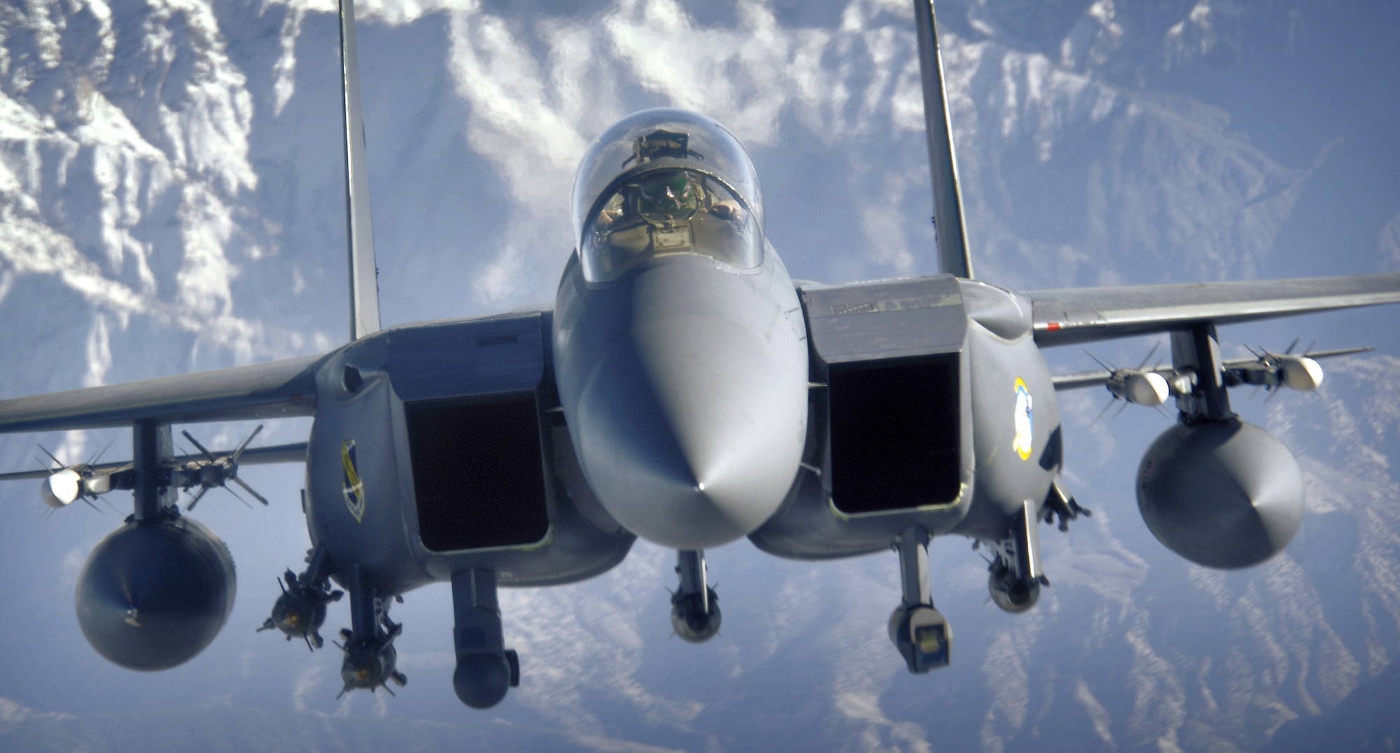 An F-15E Strike Eagle soars over the mountains of Afghanistan providing close-air support to deter enemy activities. The F-15Es and other coalition aircraft flew 111 close-air-support missions in Iraq and Afghanistan. (U.S. Air Force photo/Master Sgt. Lance Cheung)